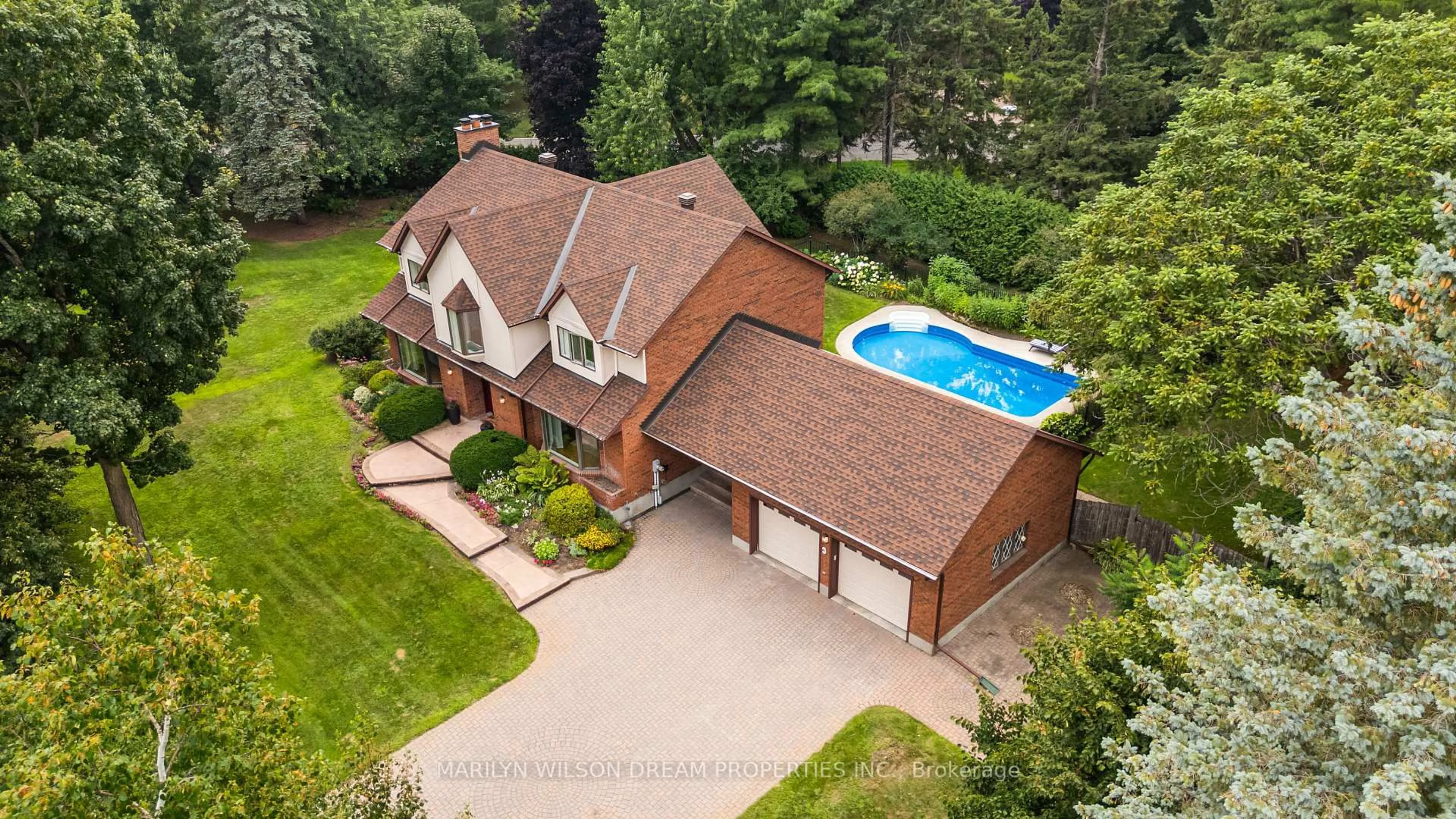 A pic from outside/outdoor area/front of a property/back of a property/a pic from drone, unknown for 3 East Healey Ave, Ottawa Ontario K2S 1J9