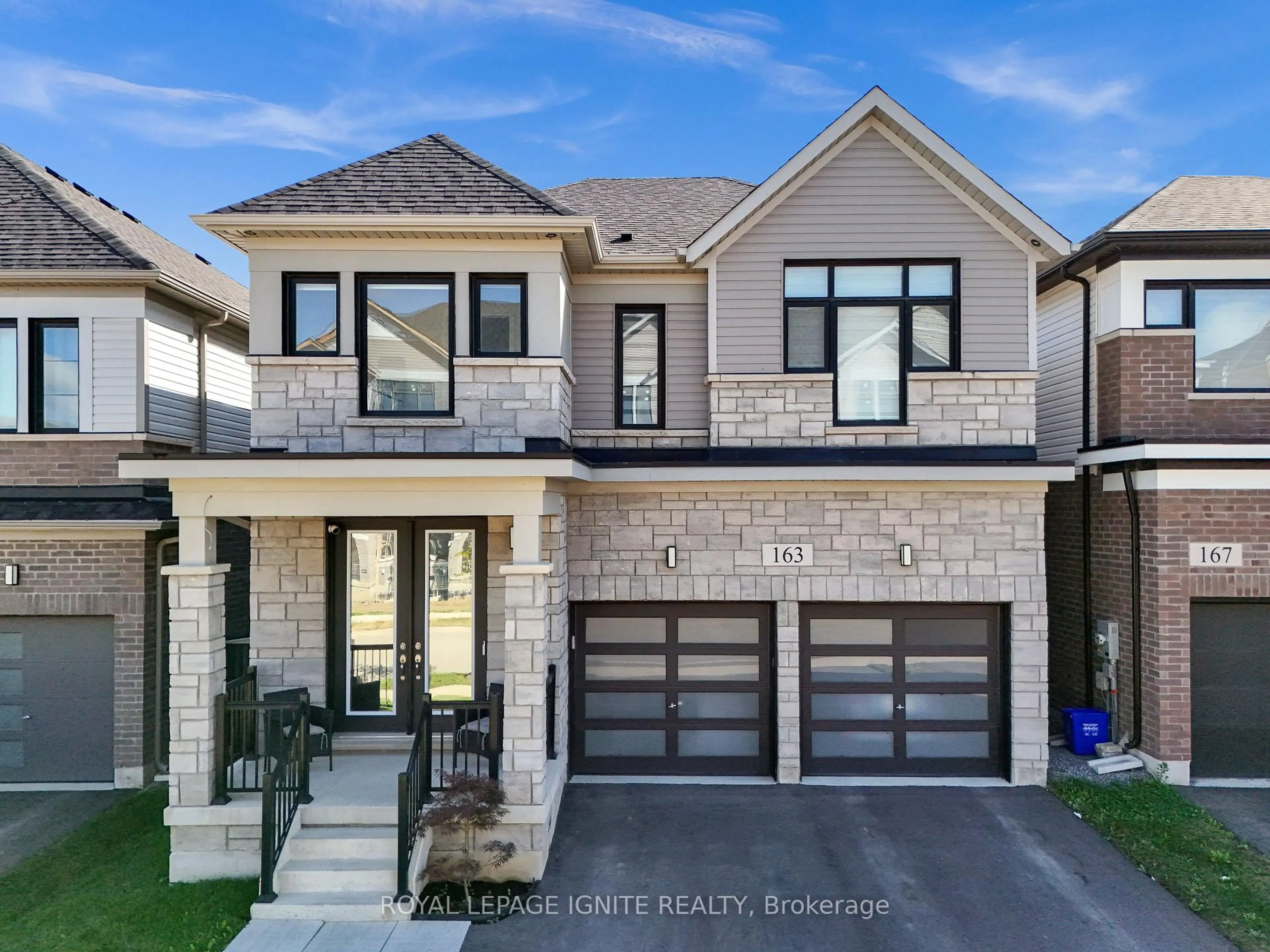 Home with brick exterior material, street for 163 Spitfire Dr, Hamilton Ontario L0R 1W0