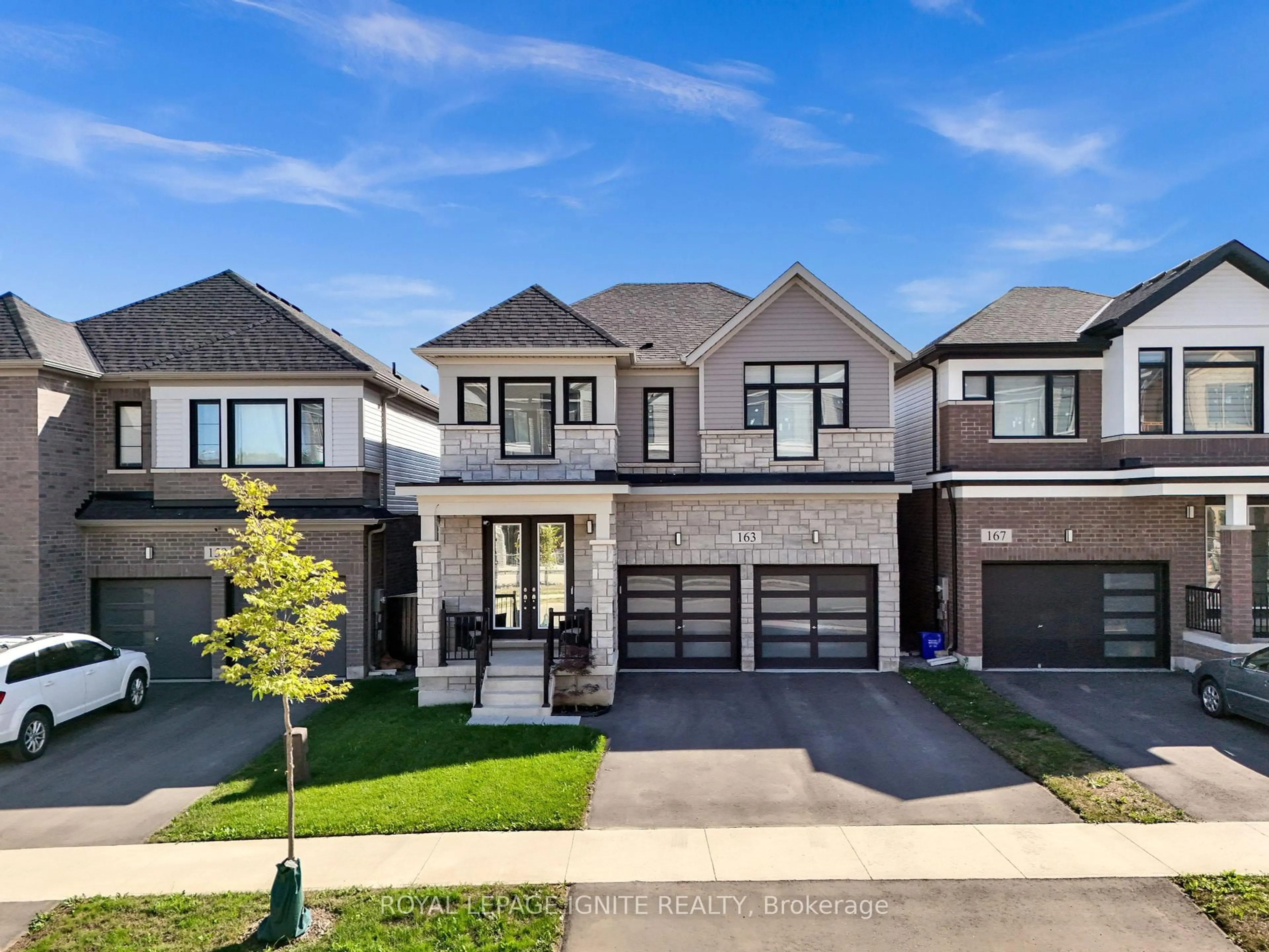 Home with brick exterior material, street for 163 Spitfire Dr, Hamilton Ontario L0R 1W0