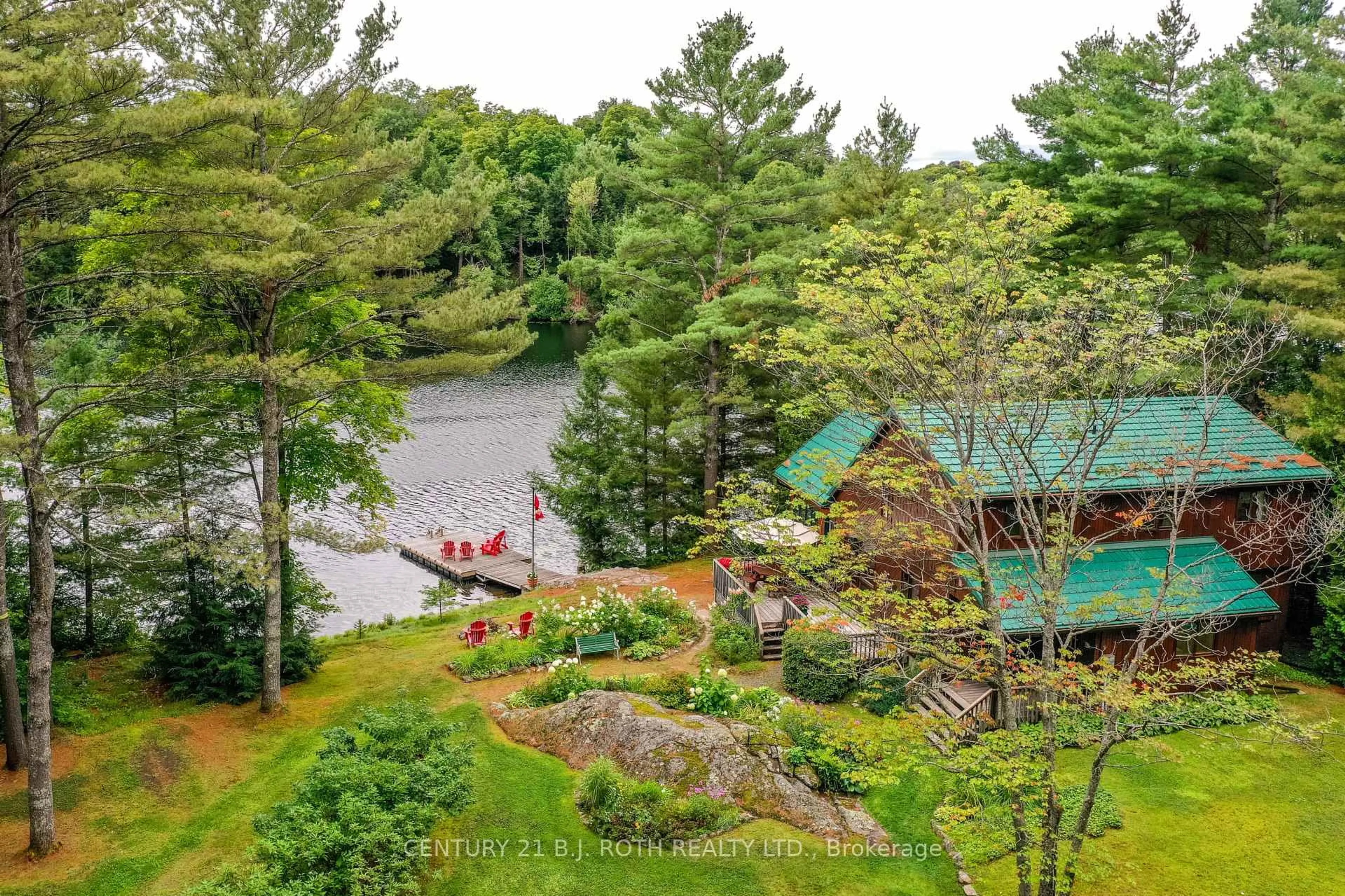 A pic from outside/outdoor area/front of a property/back of a property/a pic from drone, water/lake/river/ocean view for 29 Nestor's Lane, Seguin Ontario T2A 0B2