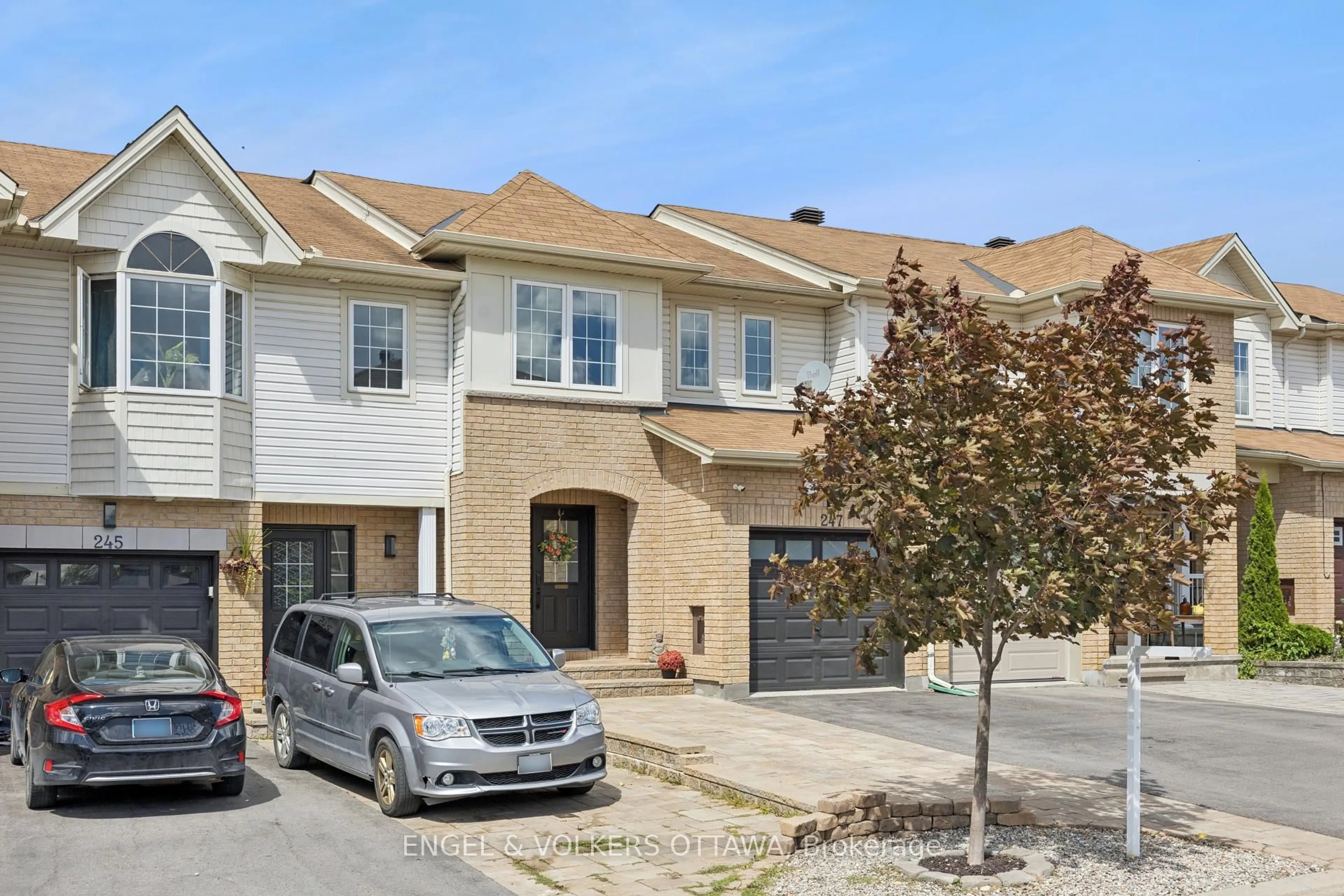 Home with brick exterior material, street for 247 Rolling Meadow Cres, Ottawa Ontario K1W 0A8
