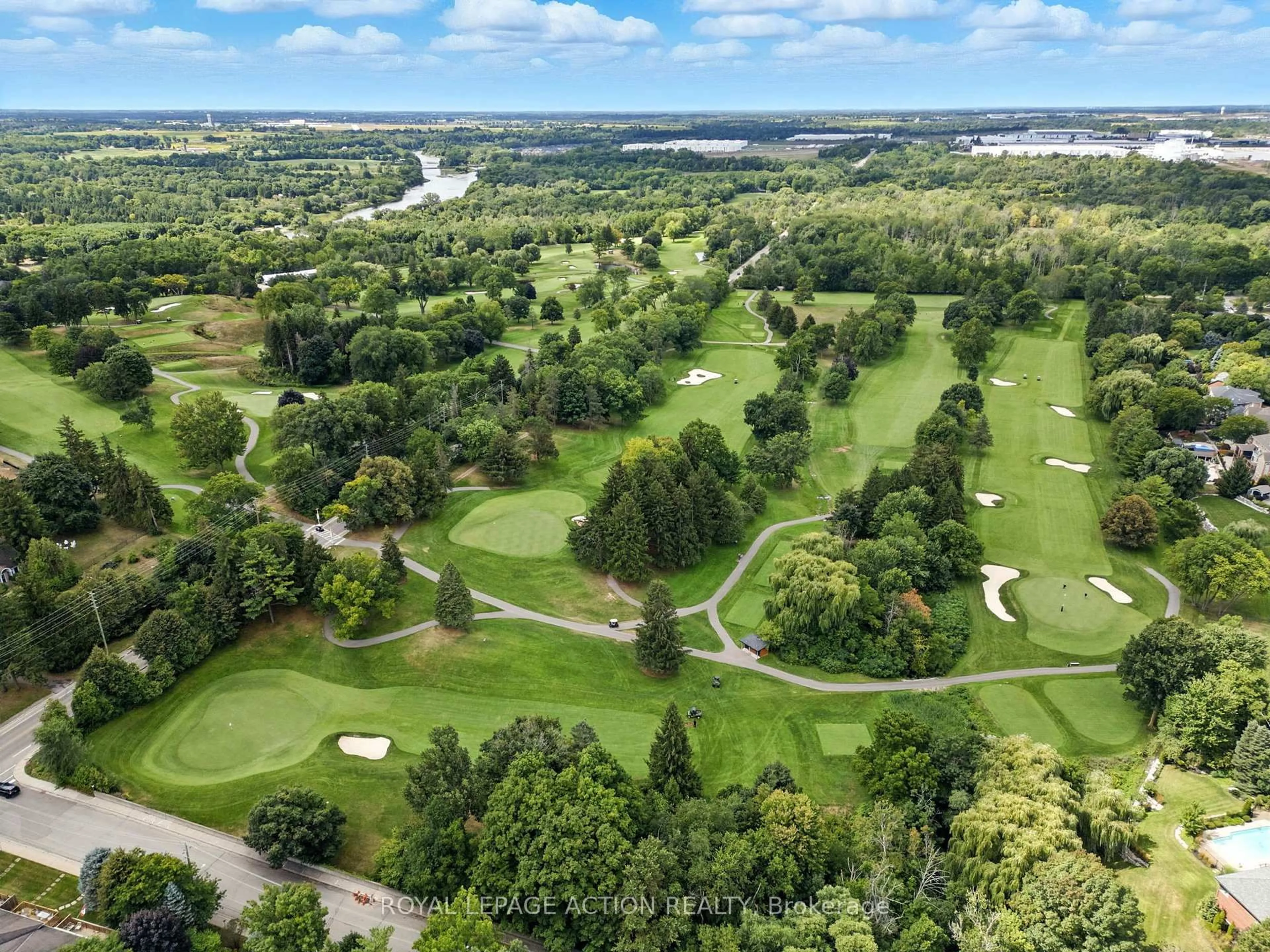 A pic from outside/outdoor area/front of a property/back of a property/a pic from drone, forest/trees view for 24 Hardy Rd #16, Brantford Ontario N3T 5K6