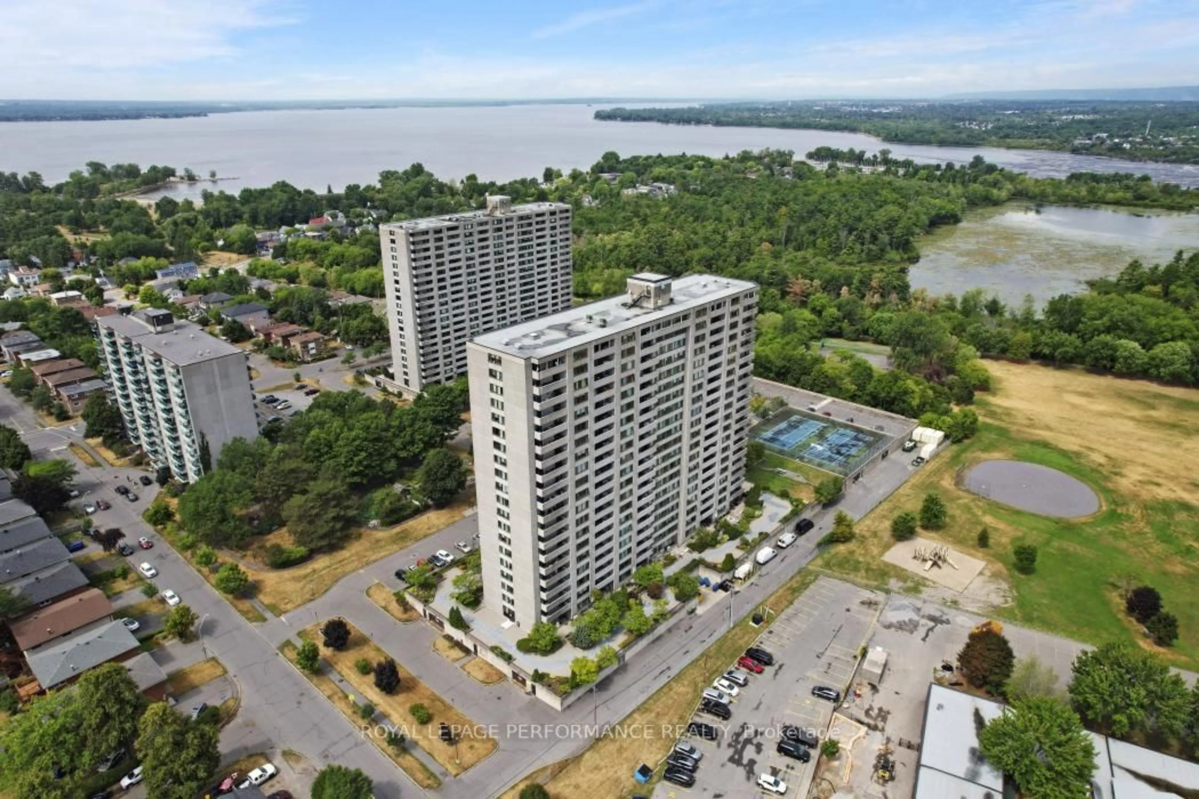 A pic from outside/outdoor area/front of a property/back of a property/a pic from drone, water/lake/river/ocean view for 2625 Regina St #301, Ottawa Ontario K2B 5W8