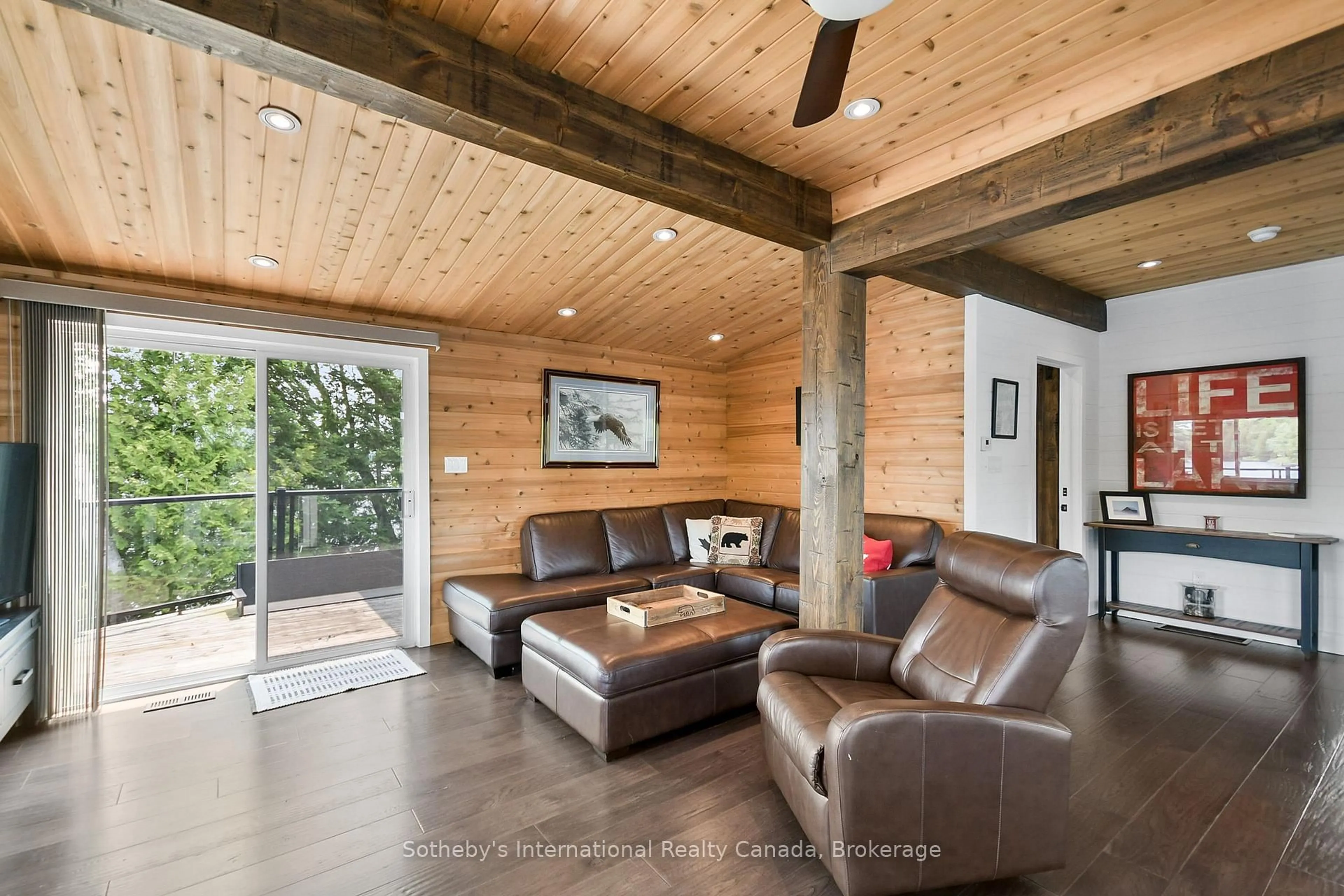 Living room with furniture, wood/laminate floor for 11D Bears Paw, Whitestone Ontario P0A 1G0