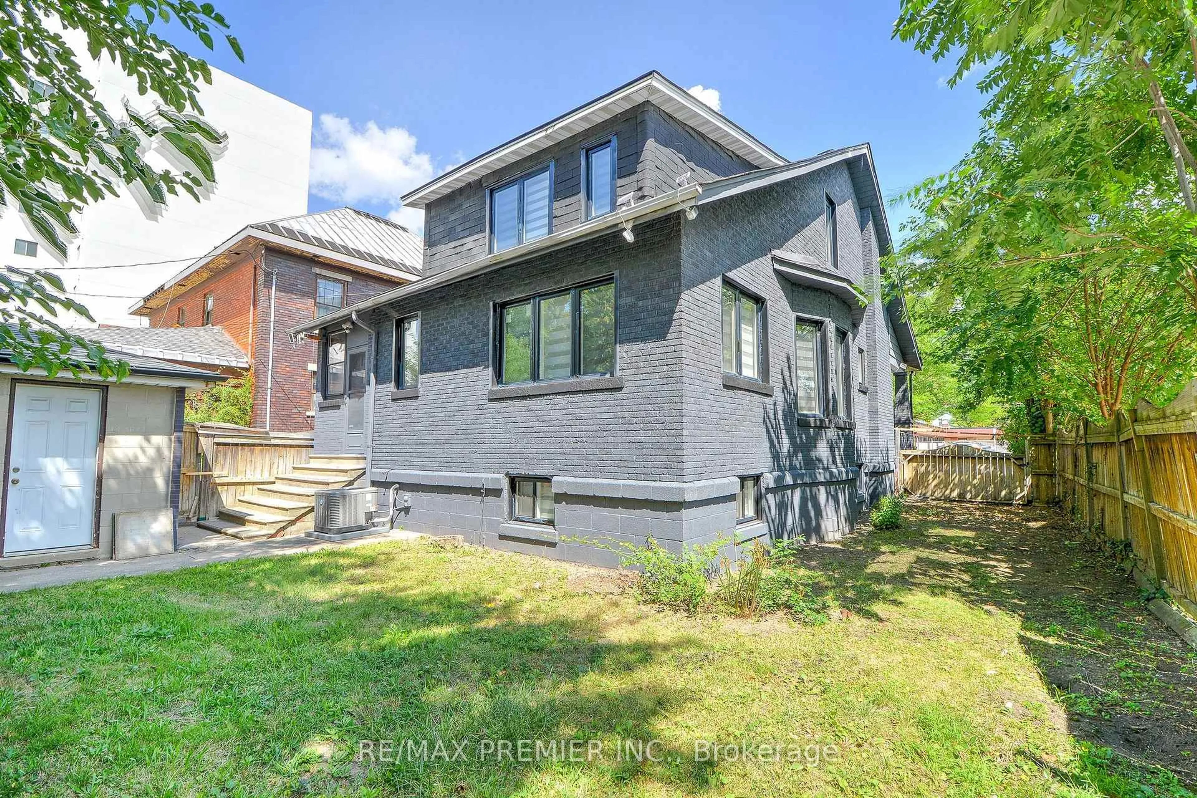 Home with brick exterior material, street for 1467 Ouellette Ave, Windsor Ontario N8X 1K1