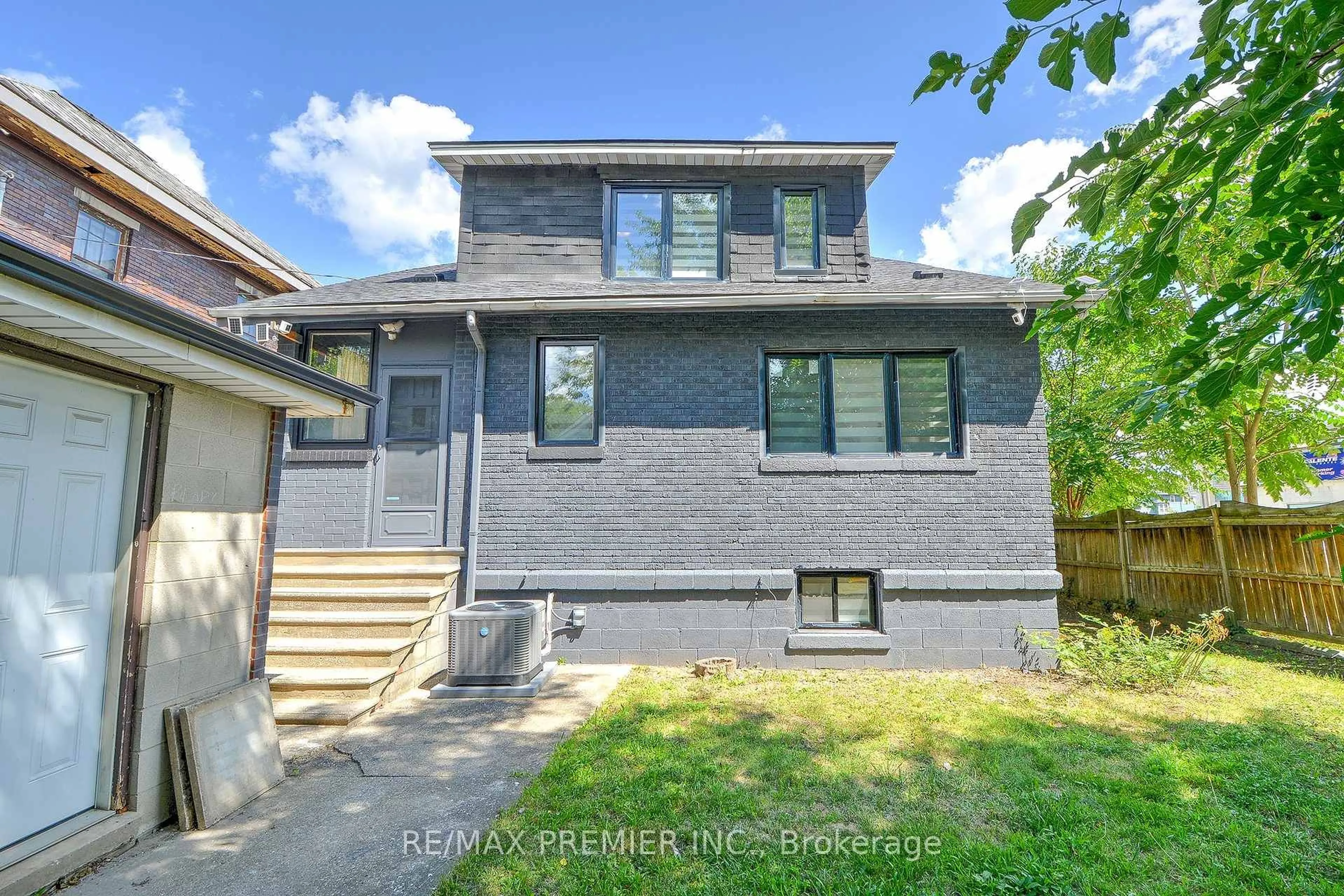 Home with brick exterior material, street for 1467 Ouellette Ave, Windsor Ontario N8X 1K1