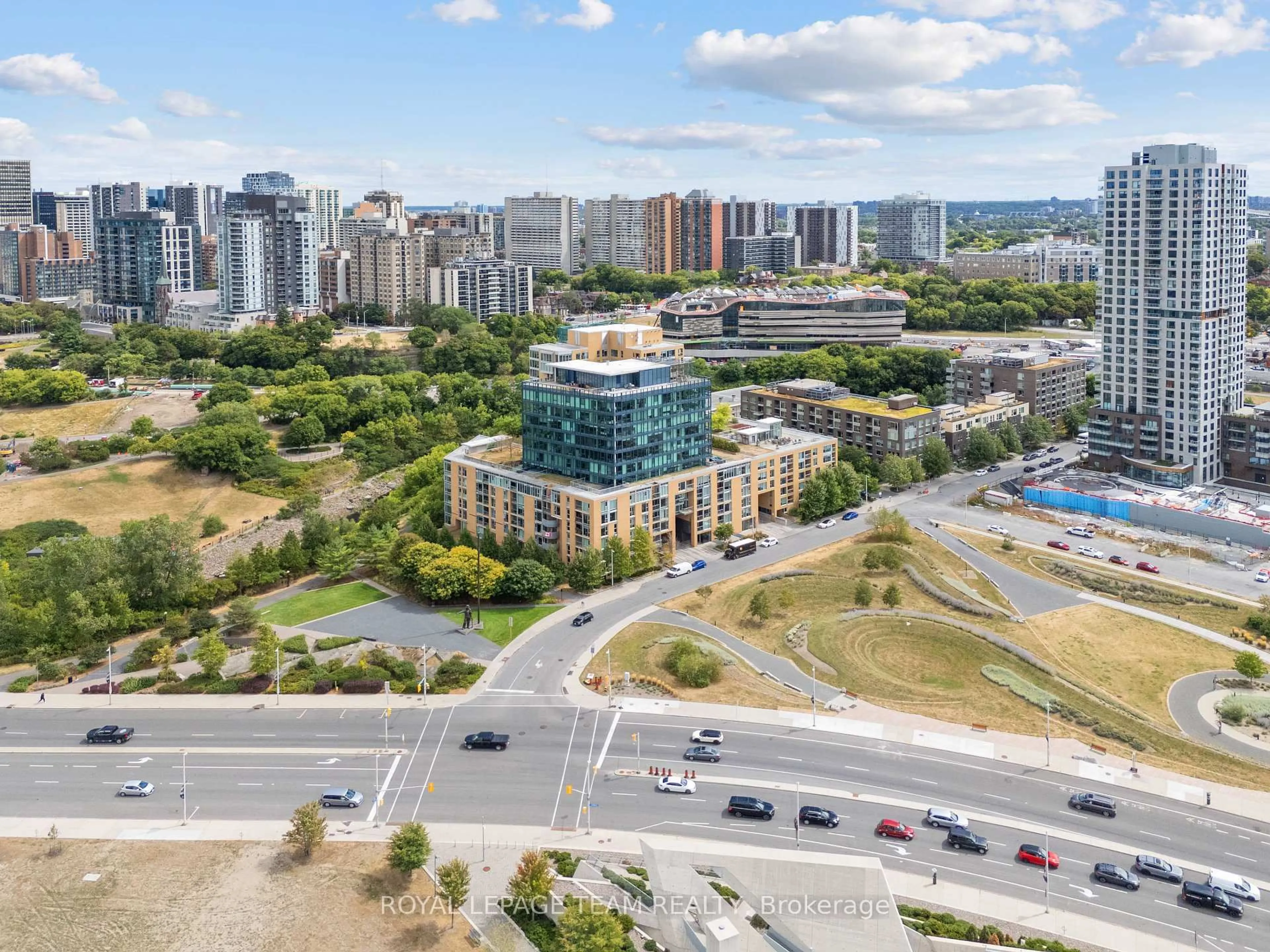 A pic from outside/outdoor area/front of a property/back of a property/a pic from drone, city buildings view from balcony for 200 Lett St #303, Ottawa Ontario K1R 0A7