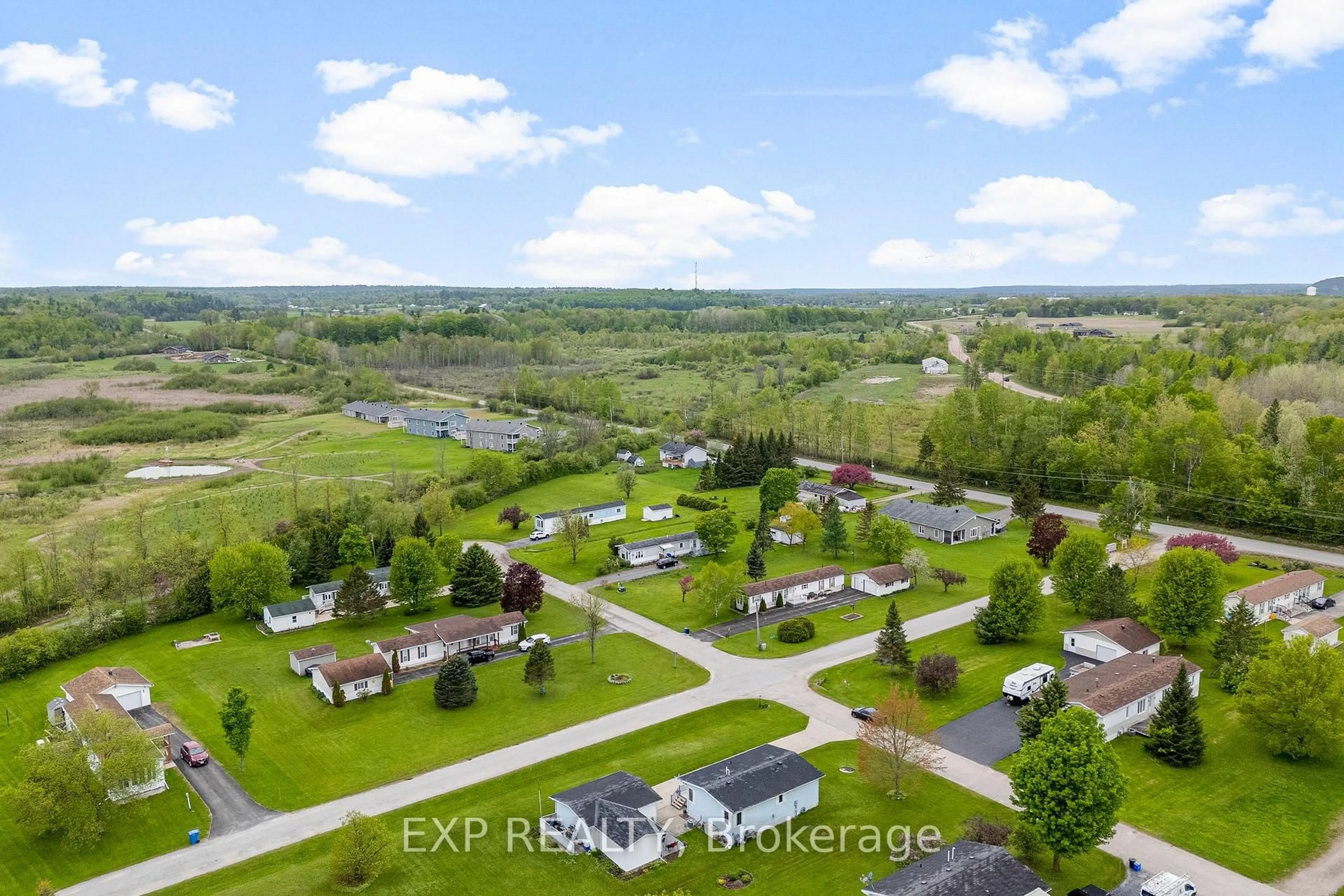 A pic from outside/outdoor area/front of a property/back of a property/a pic from drone, water/lake/river/ocean view for 25 Sunset Lane, Renfrew Ontario K7V 0A5