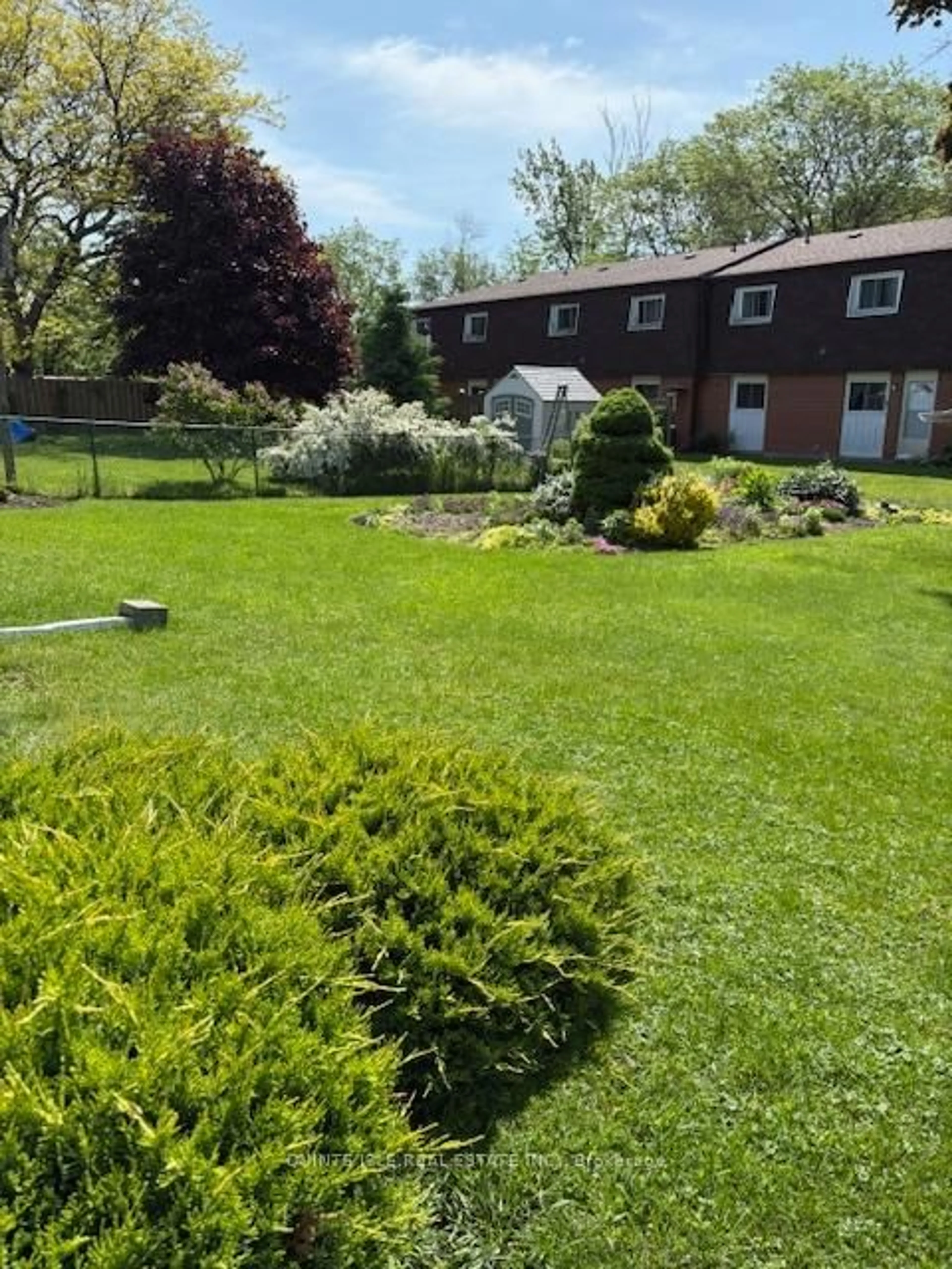 A pic from outside/outdoor area/front of a property/back of a property/a pic from drone, street for 201 NILES ST St, Prince Edward County Ontario K0K 3L0