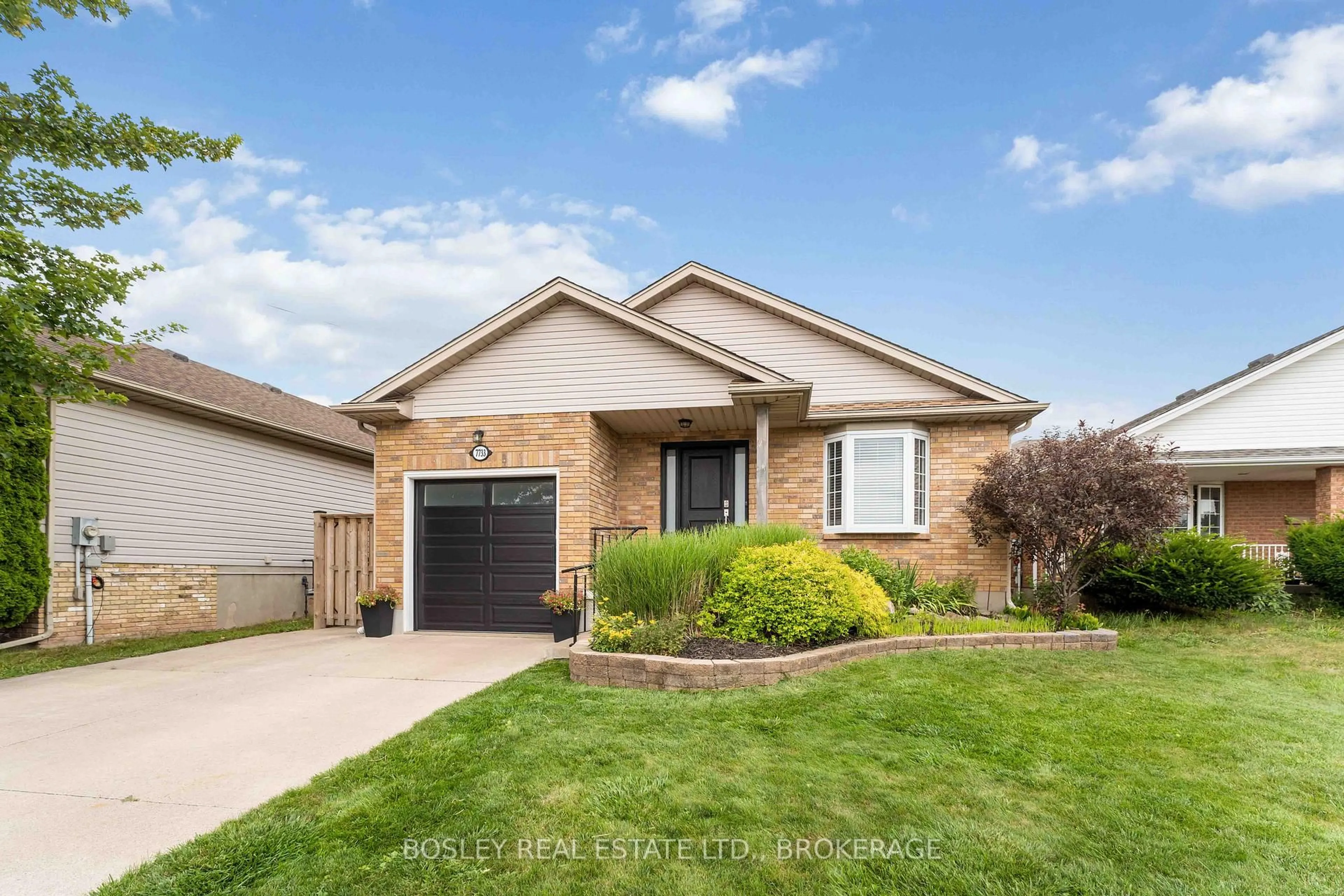 Home with brick exterior material, street for 7733 Alpine Dr, Niagara Falls Ontario L2H 3B6