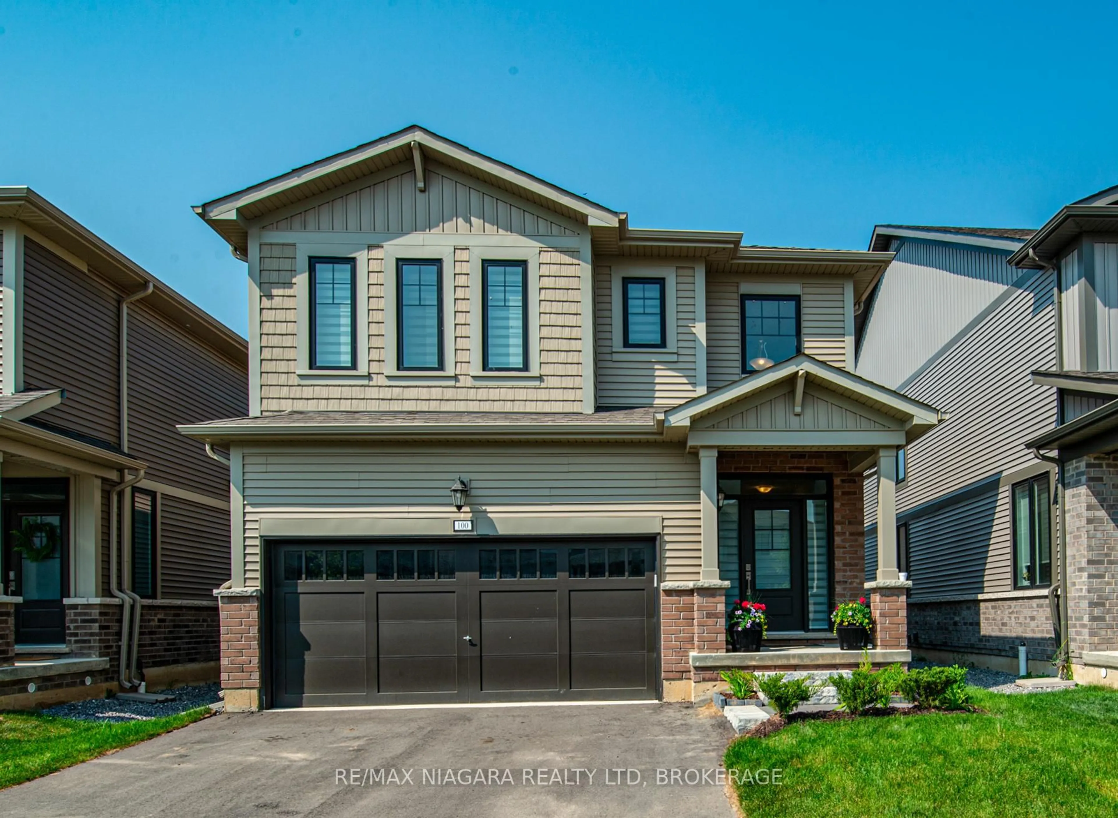 Home with brick exterior material, street for 100 Blackbird Way, Hamilton Ontario L0R 1W0