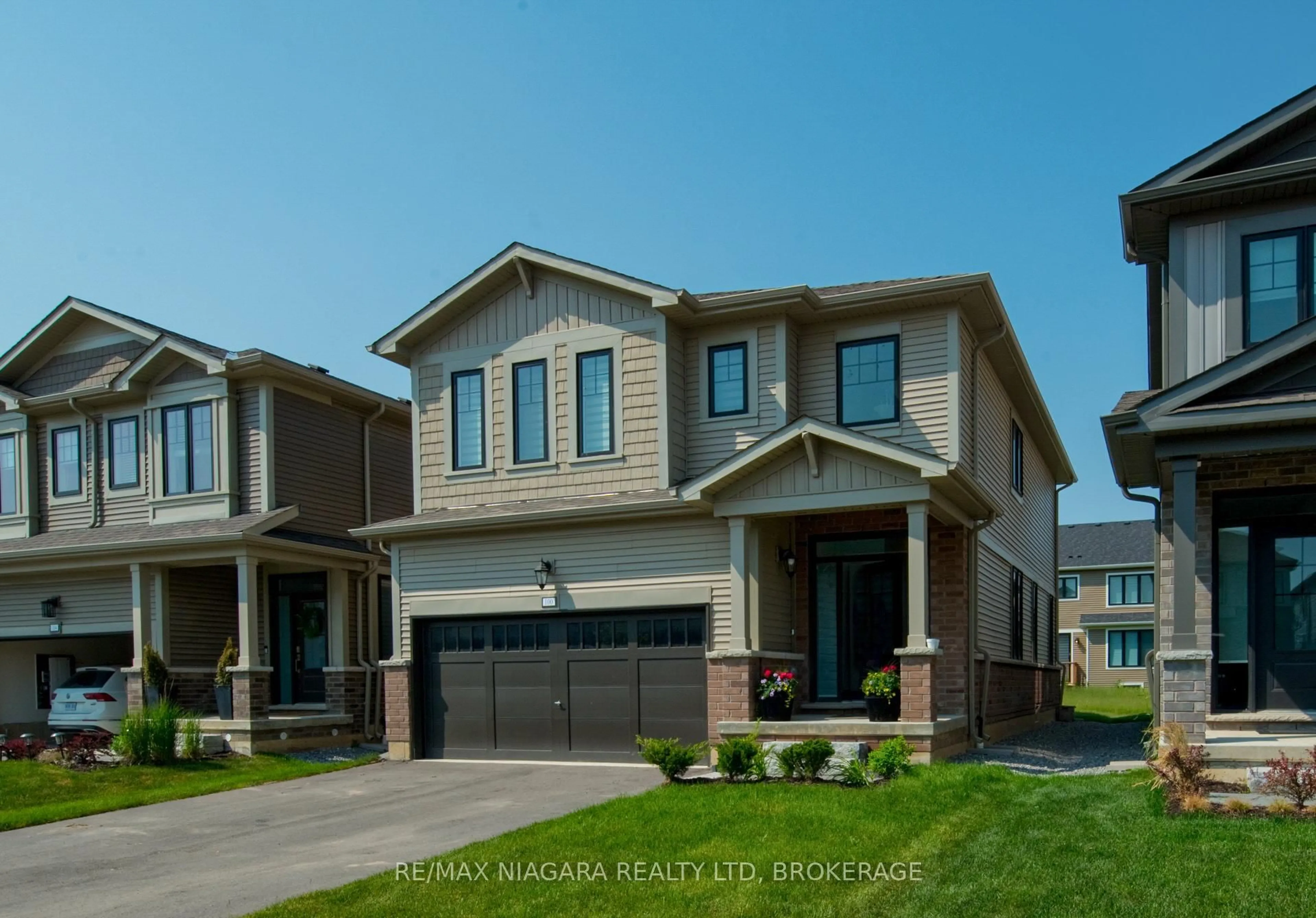 Home with brick exterior material, street for 100 Blackbird Way, Hamilton Ontario L0R 1W0