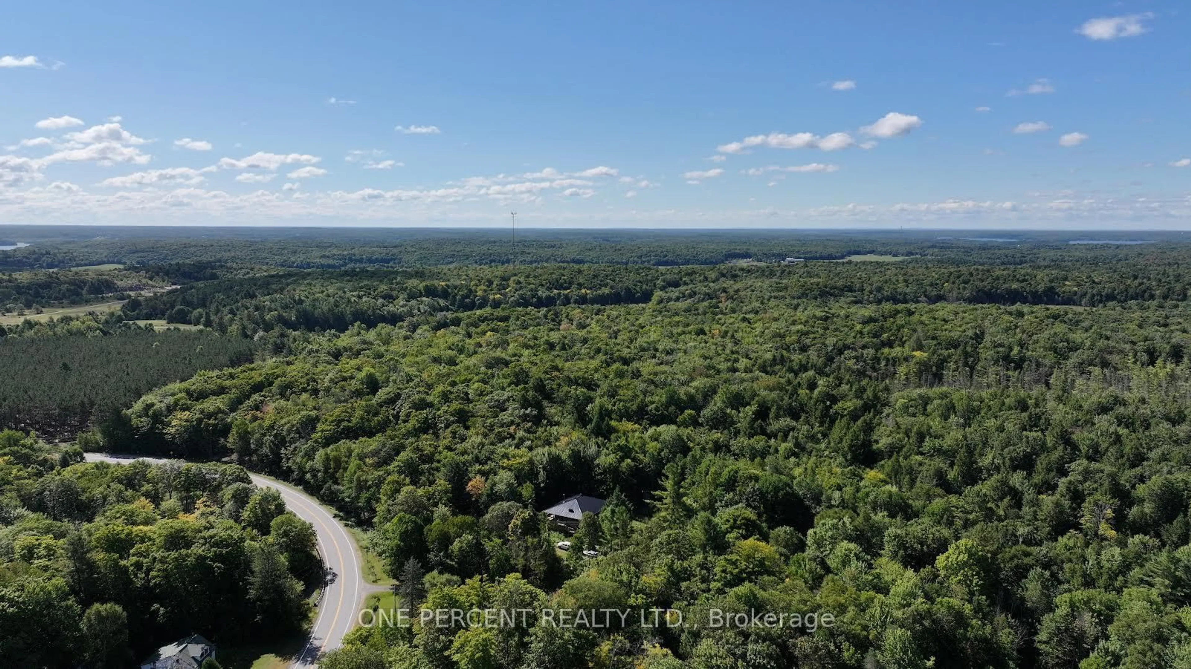 A pic from outside/outdoor area/front of a property/back of a property/a pic from drone, forest/trees view for 2831 Hwy 141 Highway, Muskoka Lakes Ontario P0B 1M0