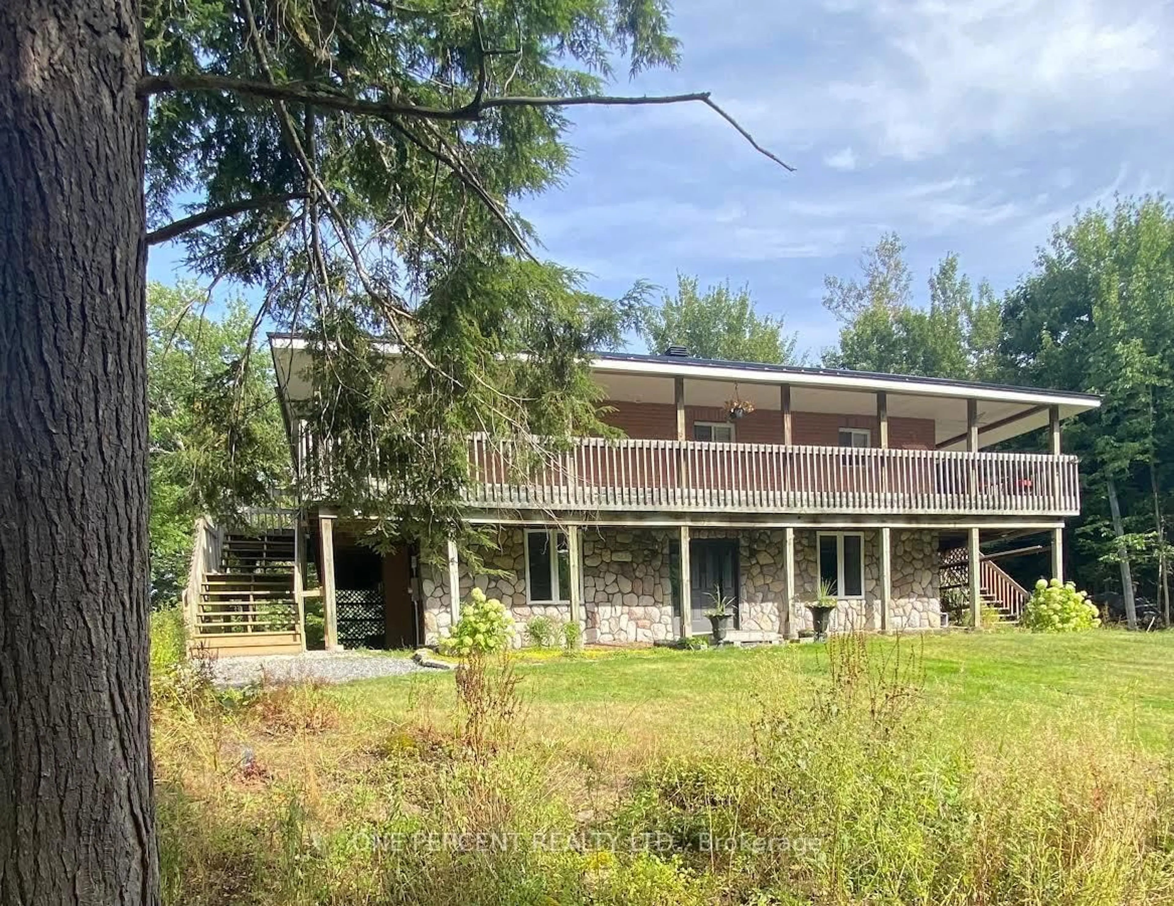 A pic from outside/outdoor area/front of a property/back of a property/a pic from drone, building for 2831 Hwy 141 Highway, Muskoka Lakes Ontario P0B 1M0