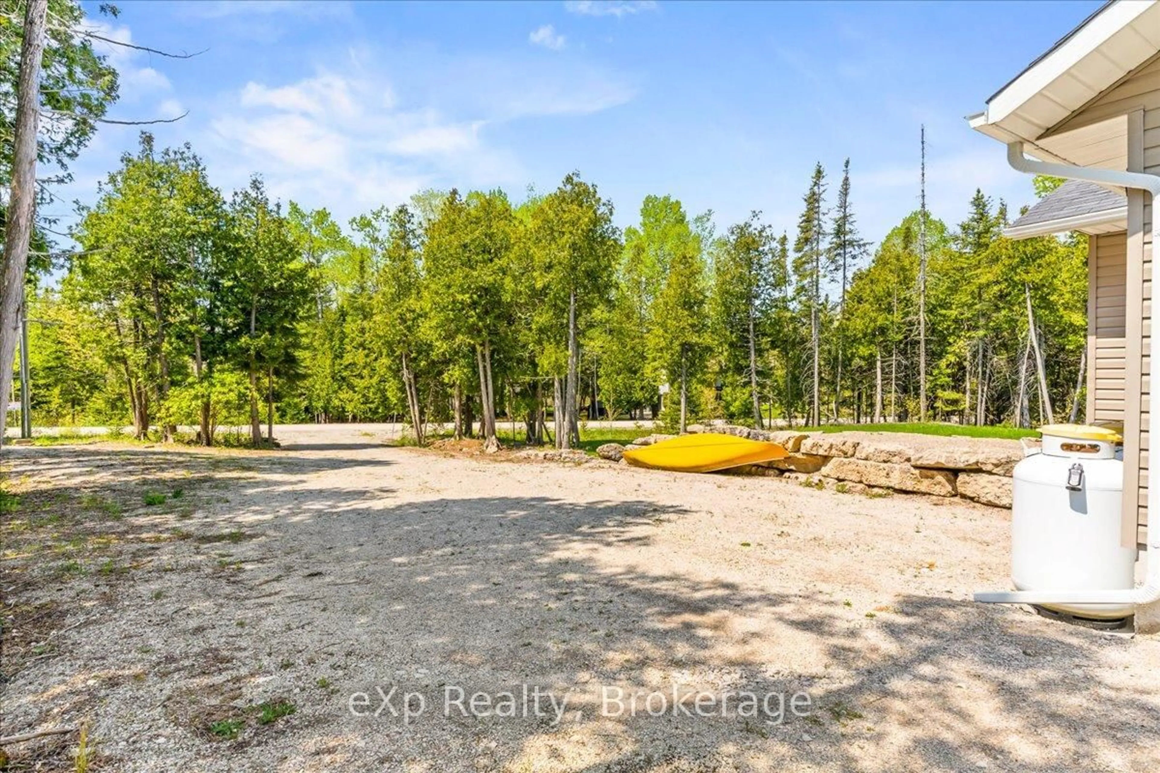 A pic from outside/outdoor area/front of a property/back of a property/a pic from drone, forest/trees view for 19 Murray Ave, Northern Bruce Peninsula Ontario N0H 1W0
