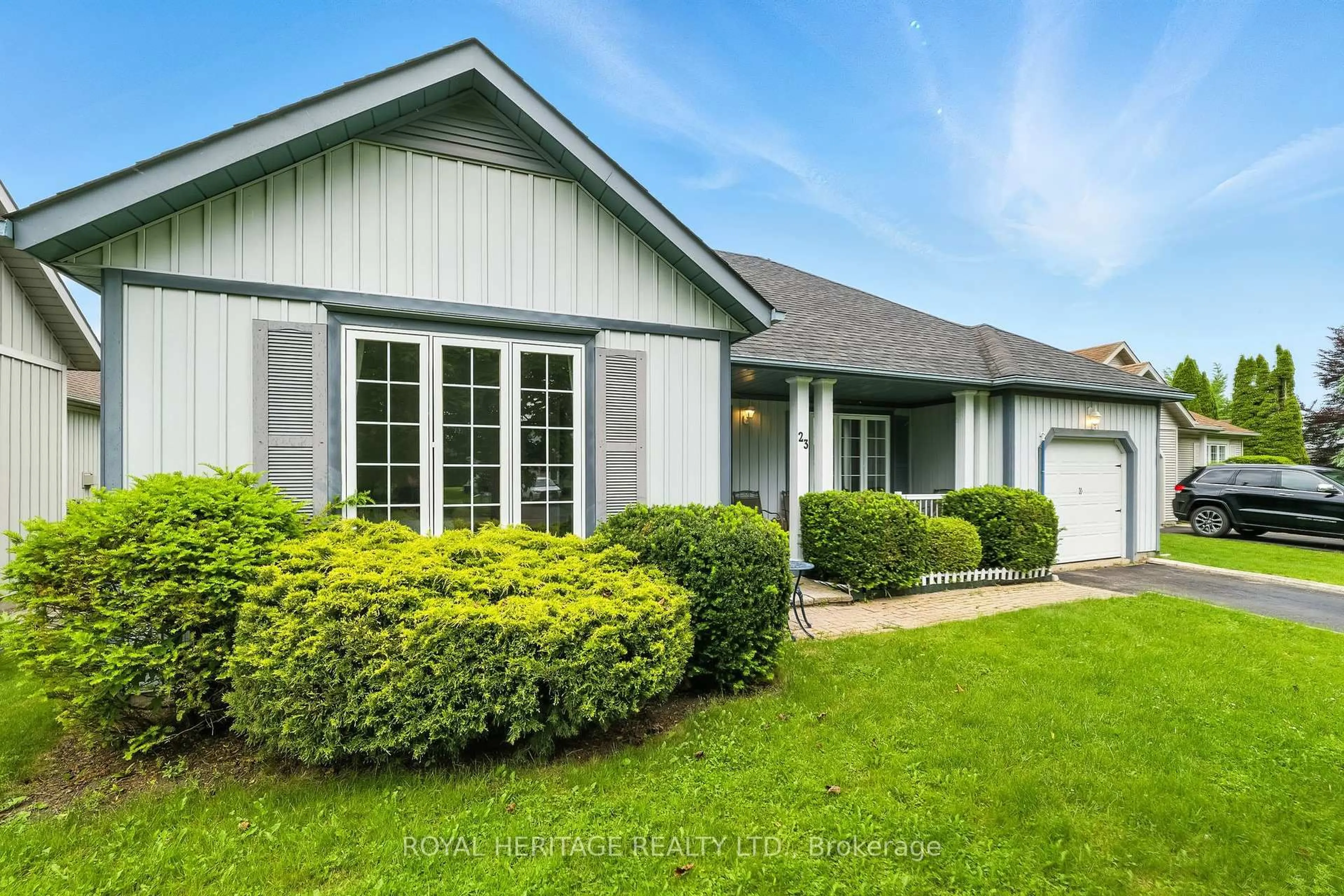 Home with vinyl exterior material, street for 23 MILLS Rd, Brighton Ontario K0K 1H0