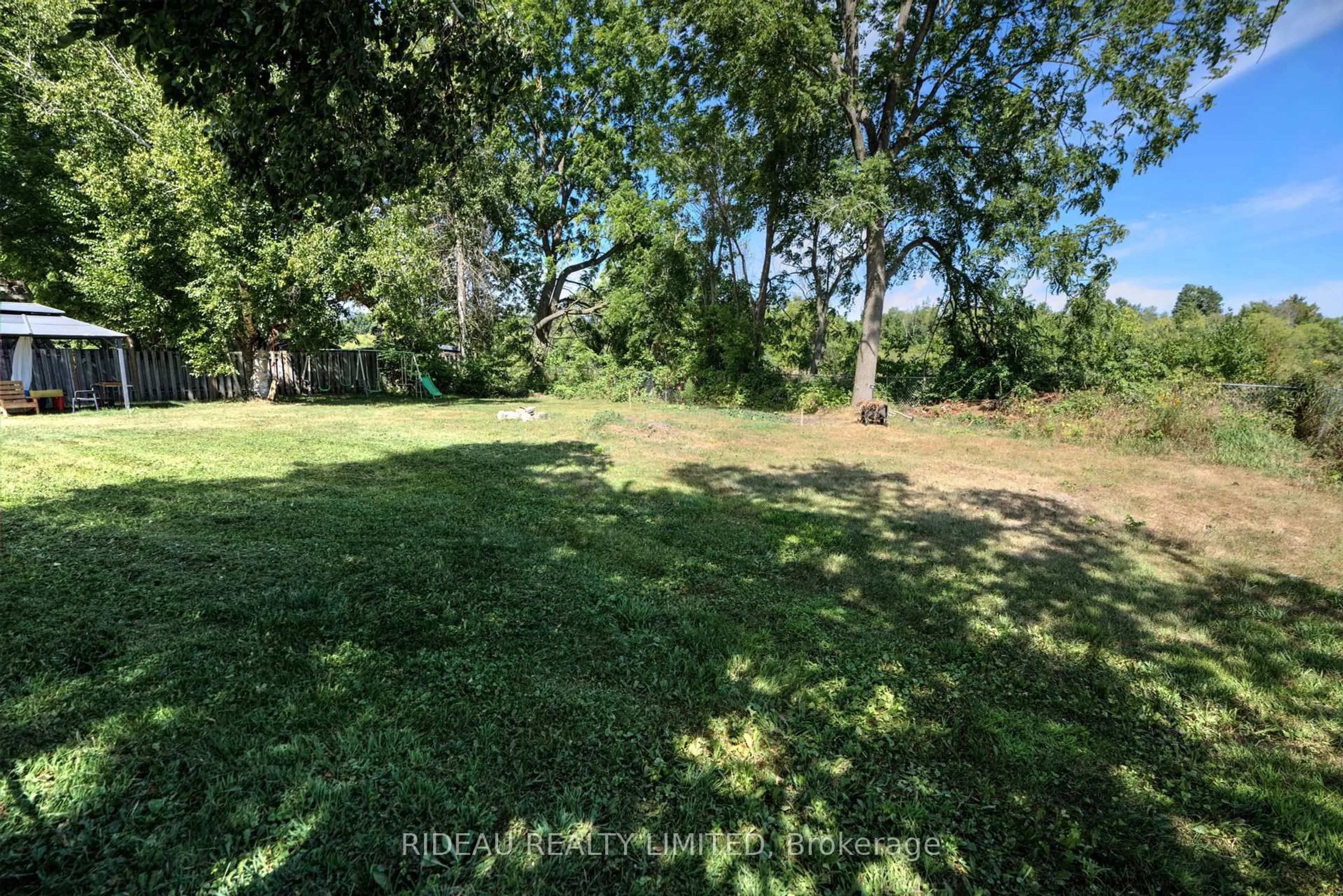 A pic from outside/outdoor area/front of a property/back of a property/a pic from drone, forest/trees view for 168 Main St, Leeds and the Thousand Islands Ontario K0H 2N0