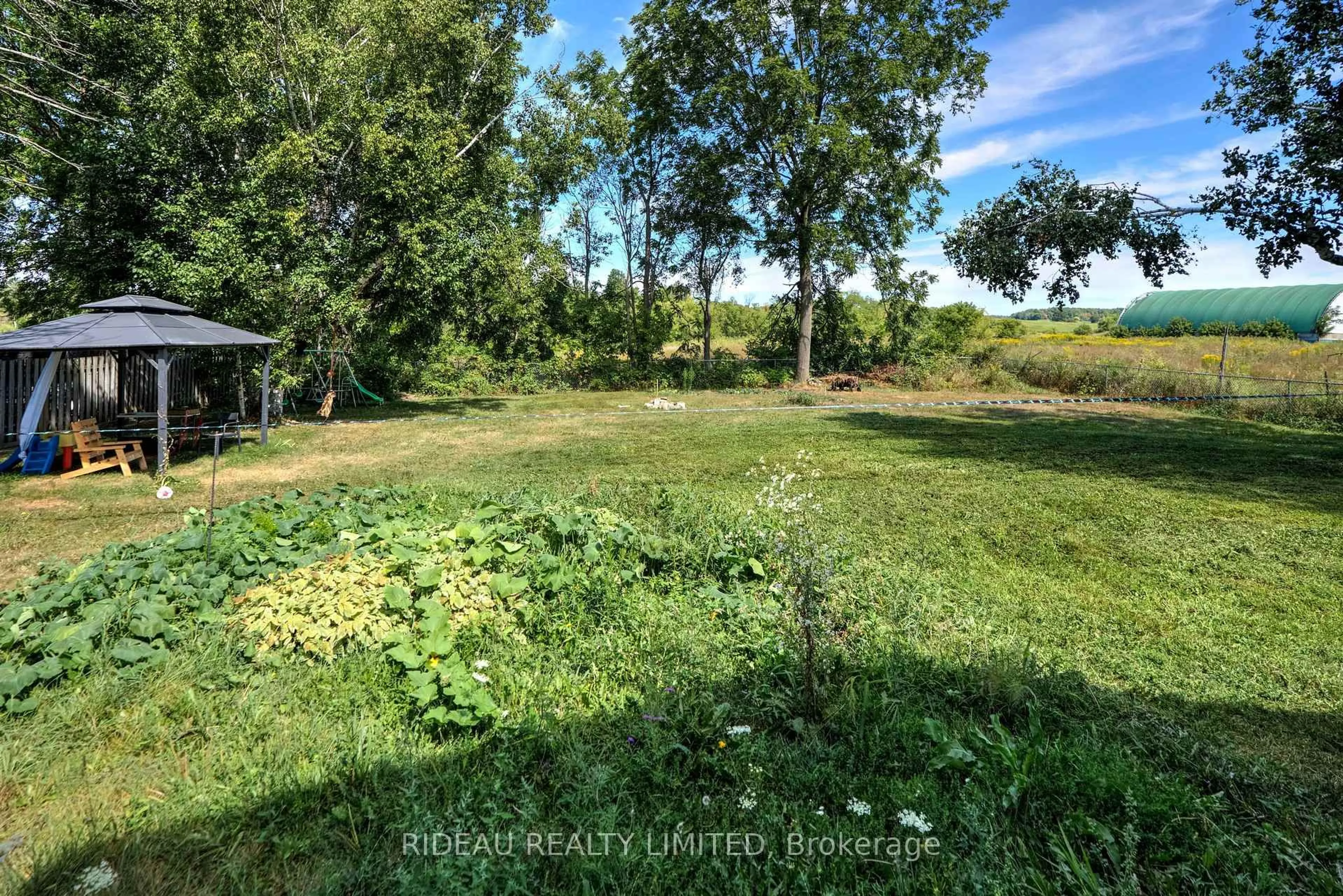 A pic from outside/outdoor area/front of a property/back of a property/a pic from drone, forest/trees view for 168 Main St, Leeds and the Thousand Islands Ontario K0H 2N0