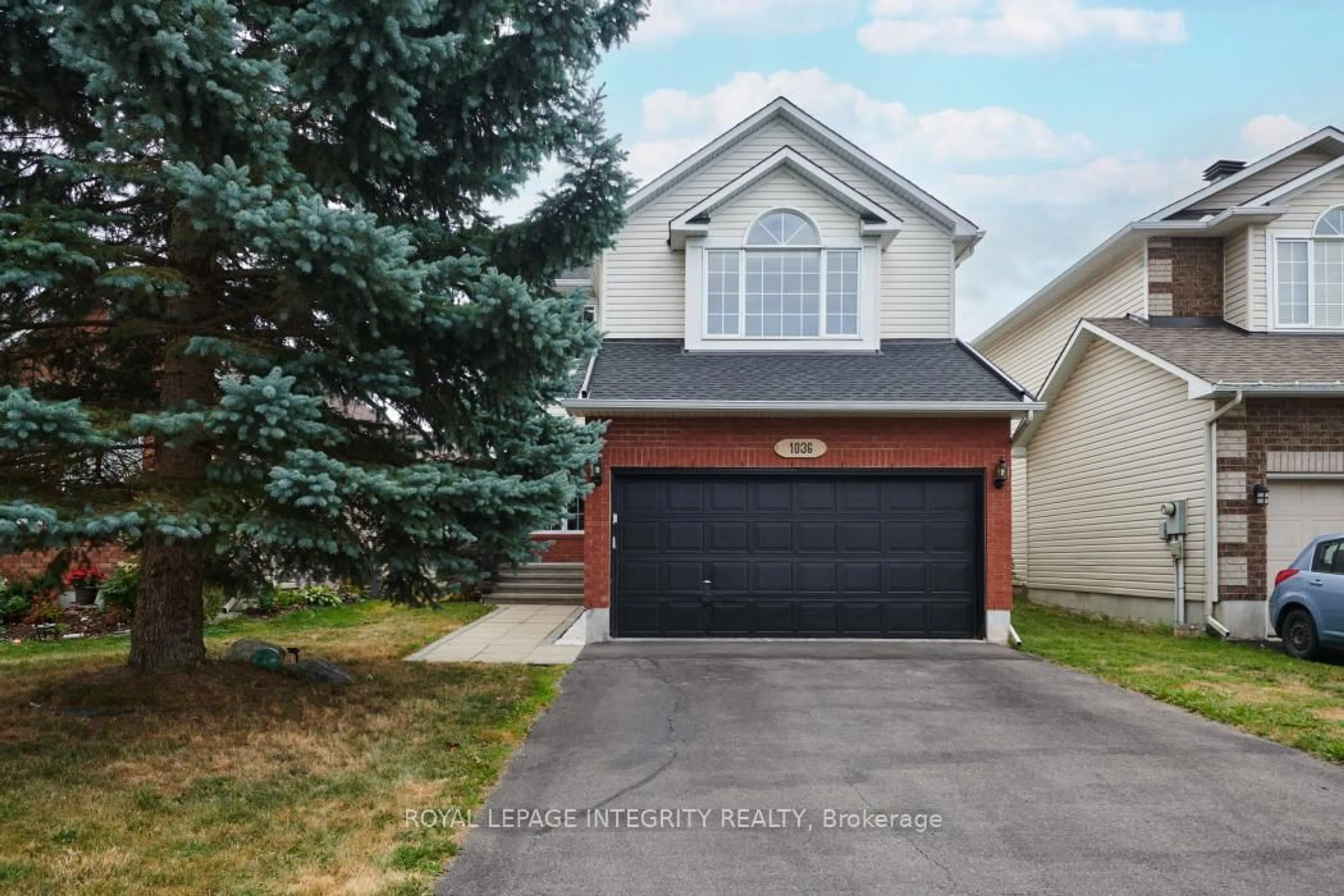 Home with vinyl exterior material, street for 1036 Rocky Harbour Cres, Ottawa Ontario K1V 1V2