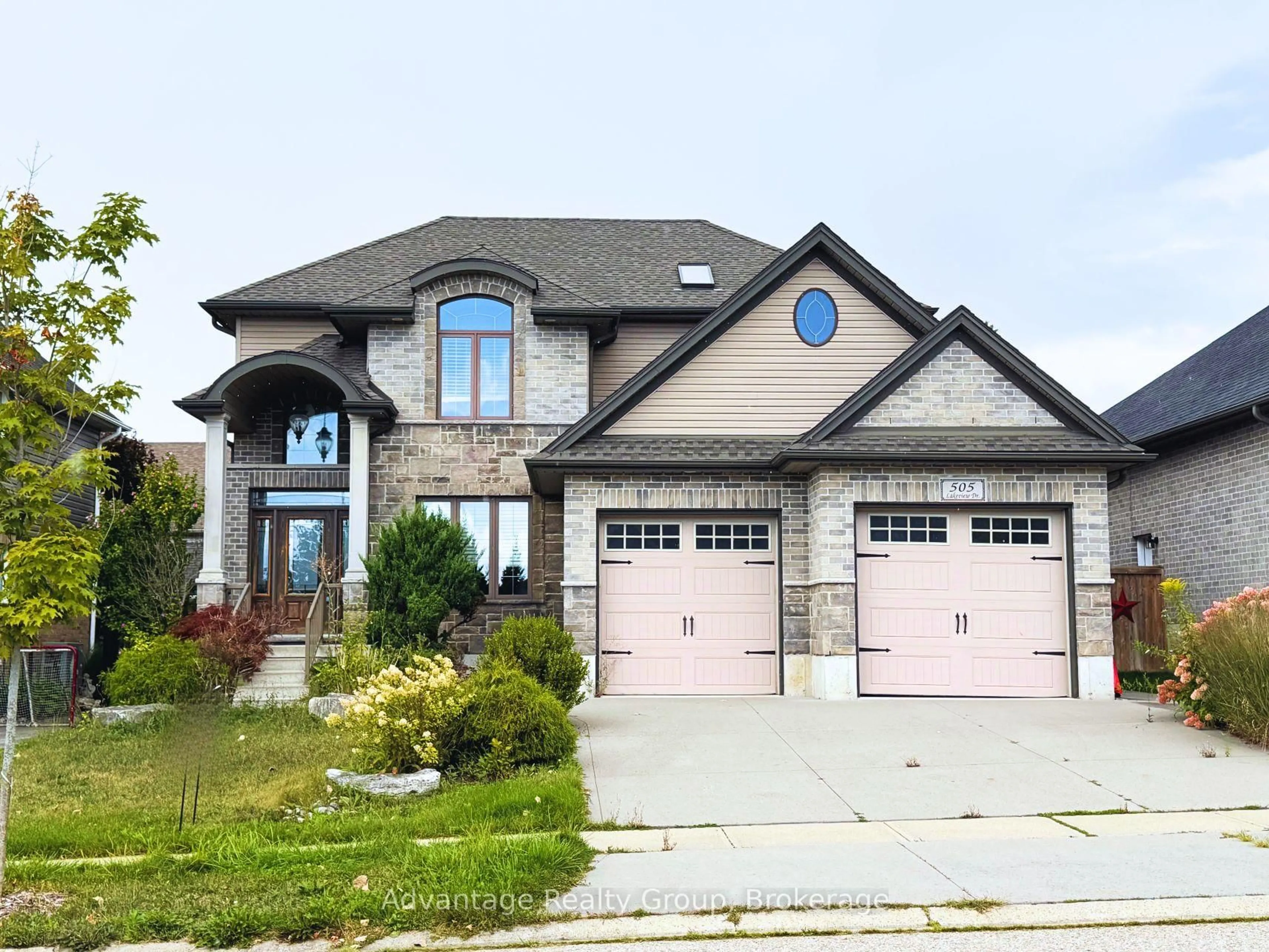 Home with brick exterior material, street for 505 Lakeview Dr, Woodstock Ontario N4T 0C7