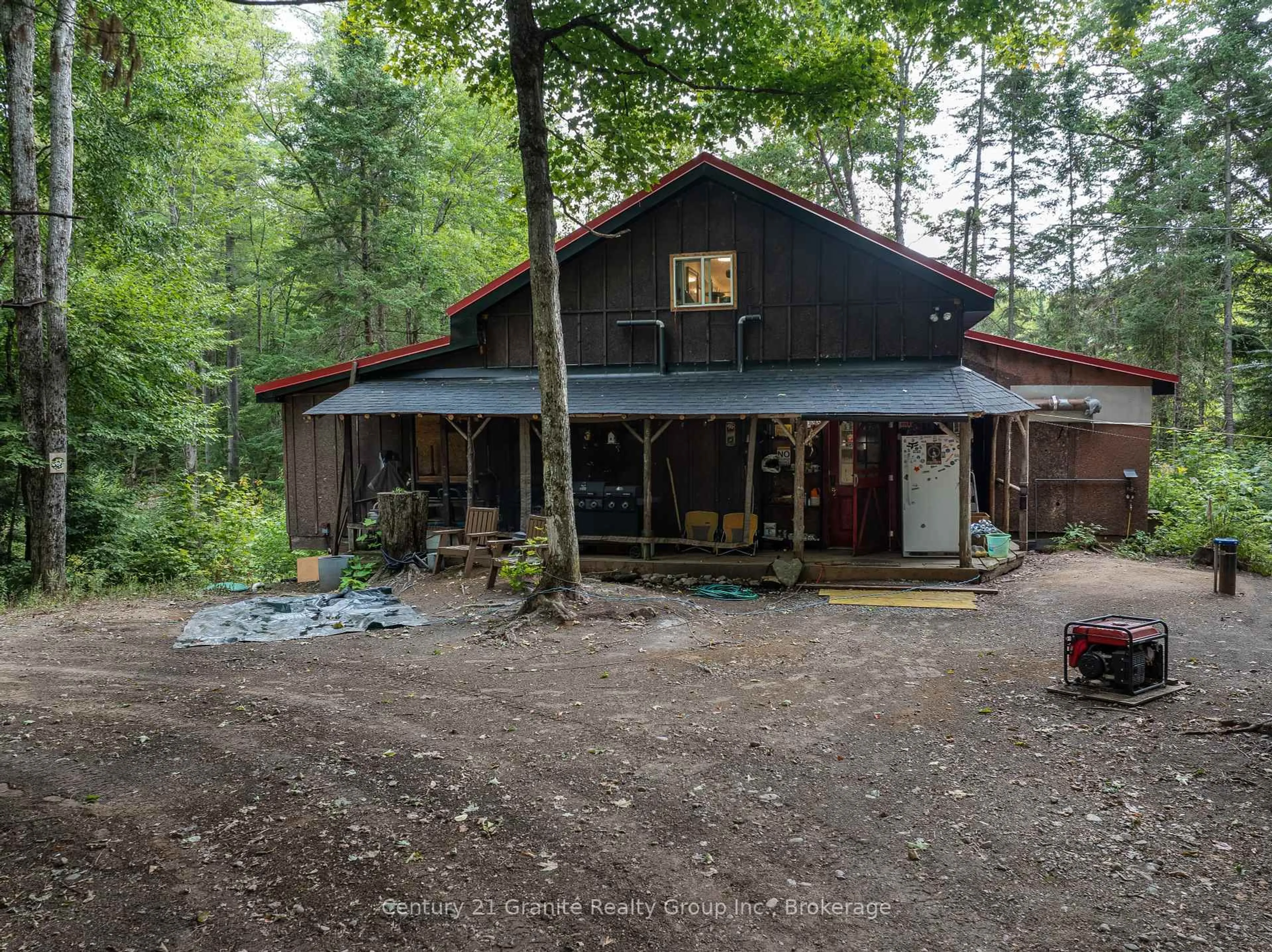 A pic from outside/outdoor area/front of a property/back of a property/a pic from drone, forest/trees view for 17812 Highway 35, Algonquin Highlands Ontario K0M 1S0
