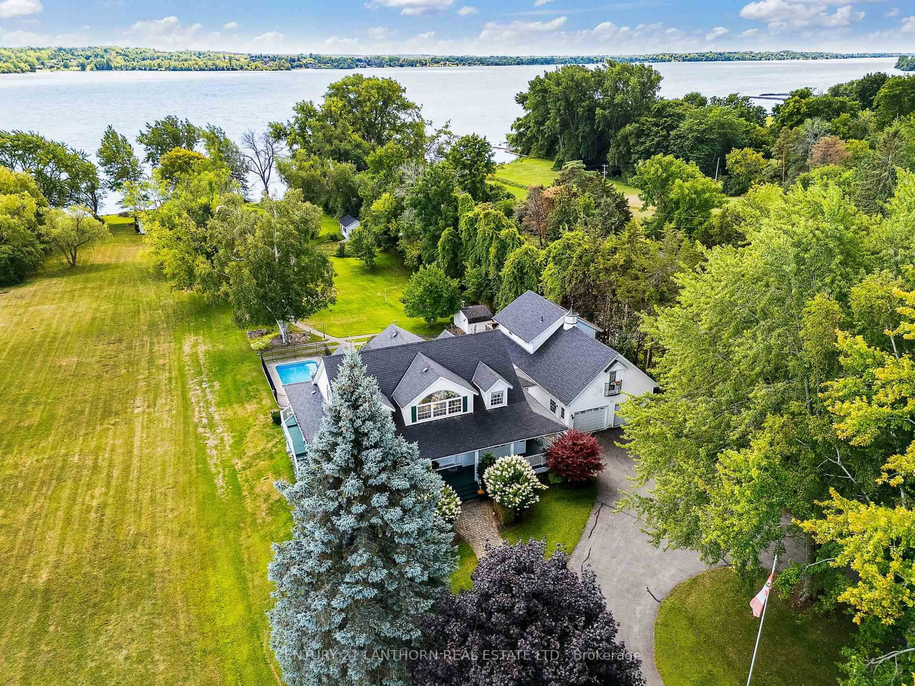 A pic from outside/outdoor area/front of a property/back of a property/a pic from drone, water/lake/river/ocean view for 630 Old Highway 2 Highway, Quinte West Ontario K8V 5P5