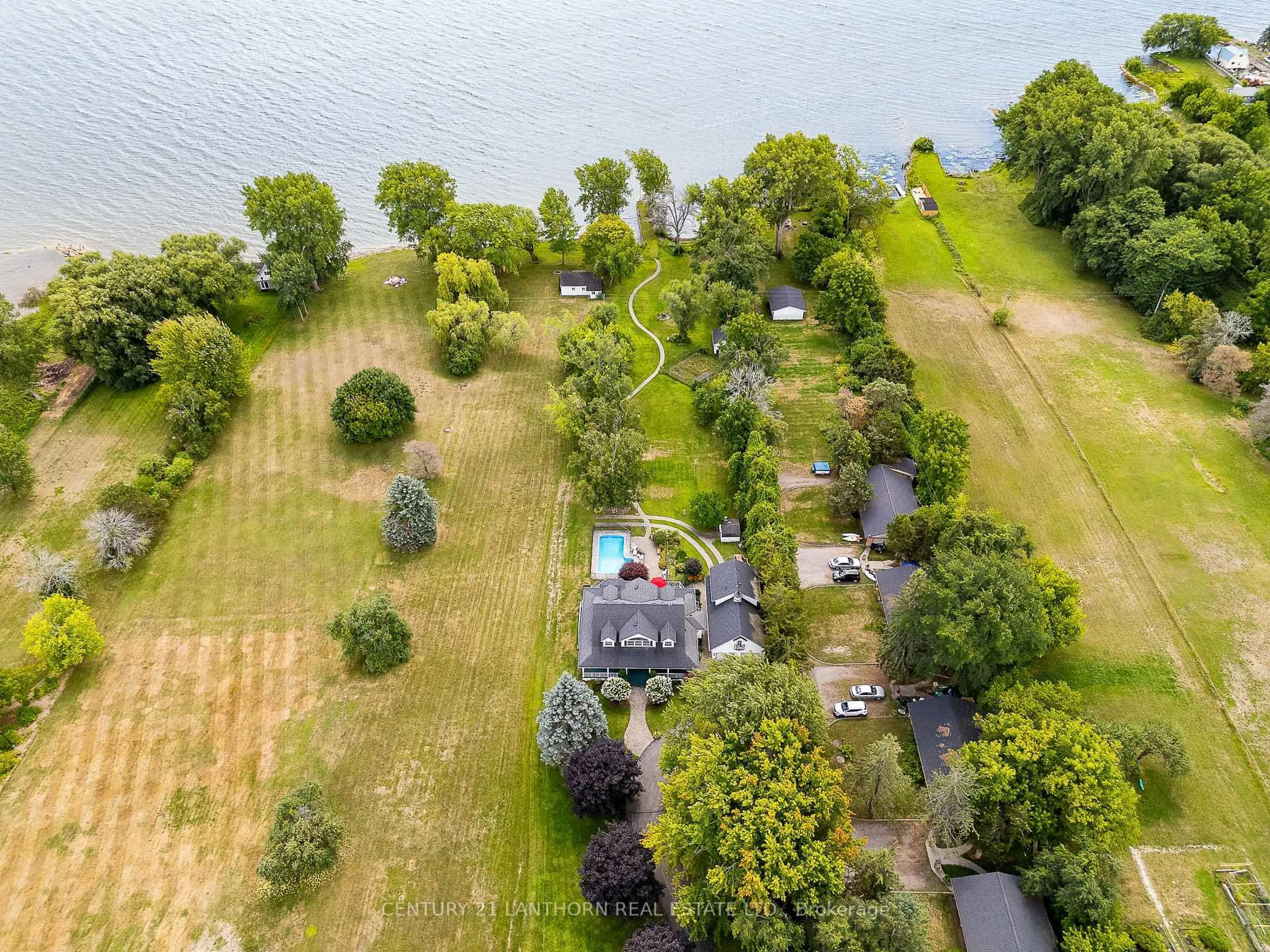 A pic from outside/outdoor area/front of a property/back of a property/a pic from drone, water/lake/river/ocean view for 630 Old Highway 2 Highway, Quinte West Ontario K8V 5P5