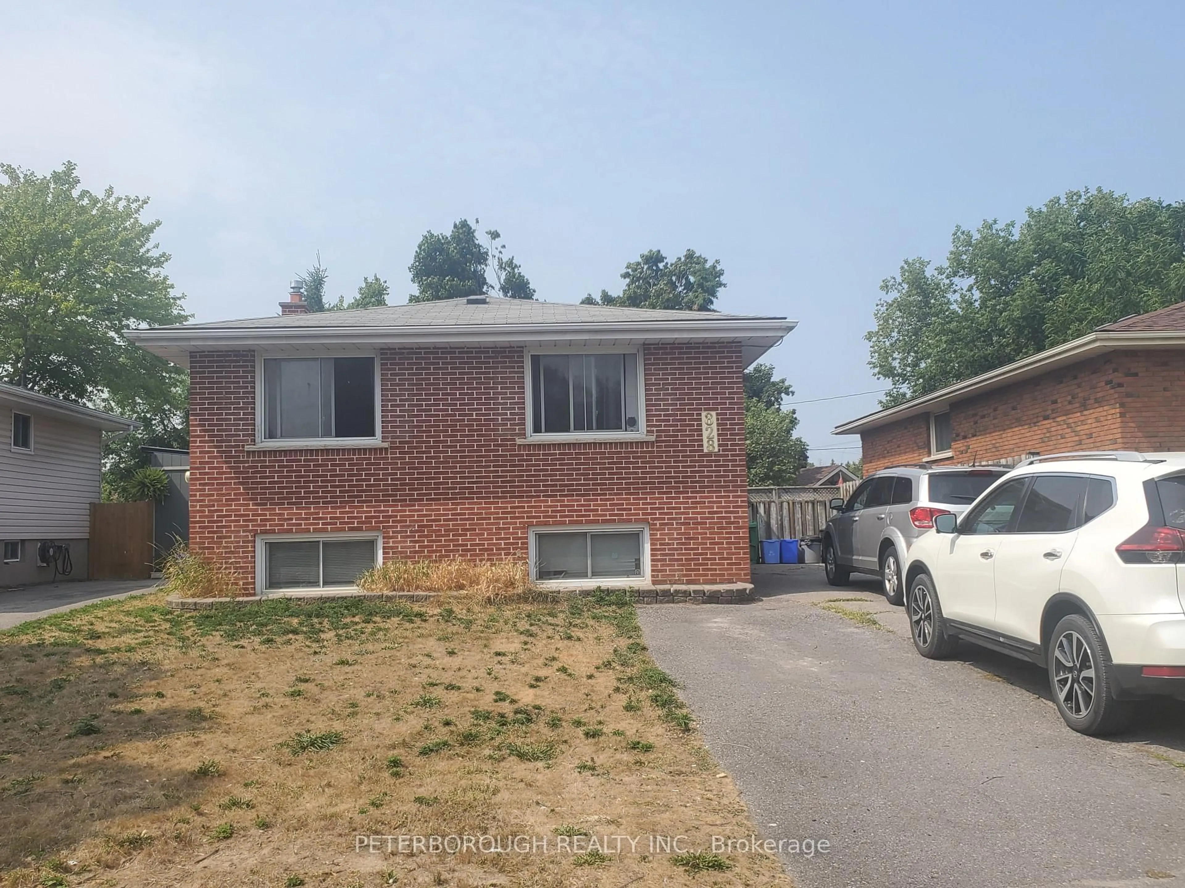 Home with brick exterior material, street for 828 Cameron St, Peterborough Ontario K9J 4A3