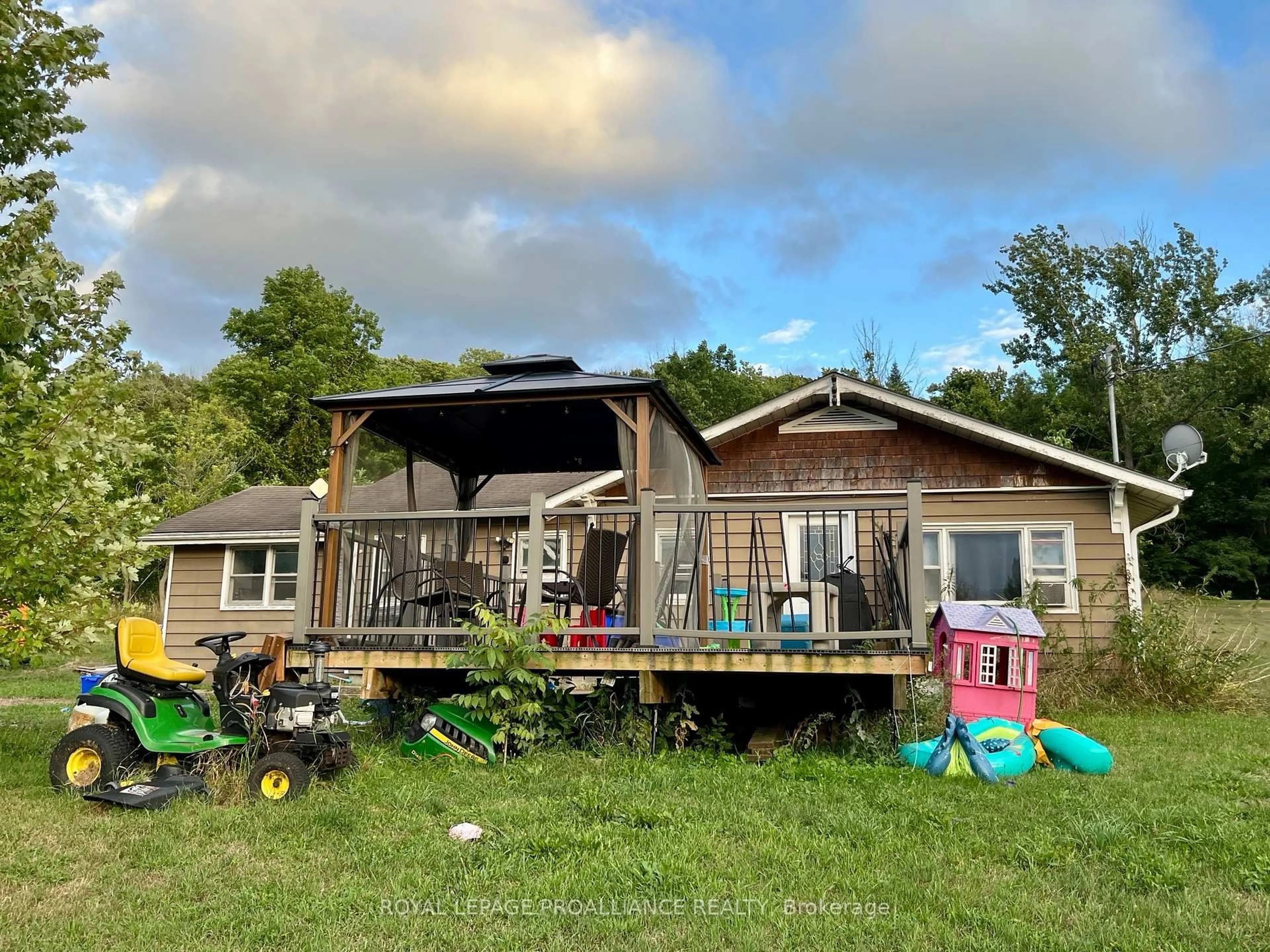 A pic from outside/outdoor area/front of a property/back of a property/a pic from drone, unknown for 2251 County Road 3, Prince Edward County Ontario K0K 1L0