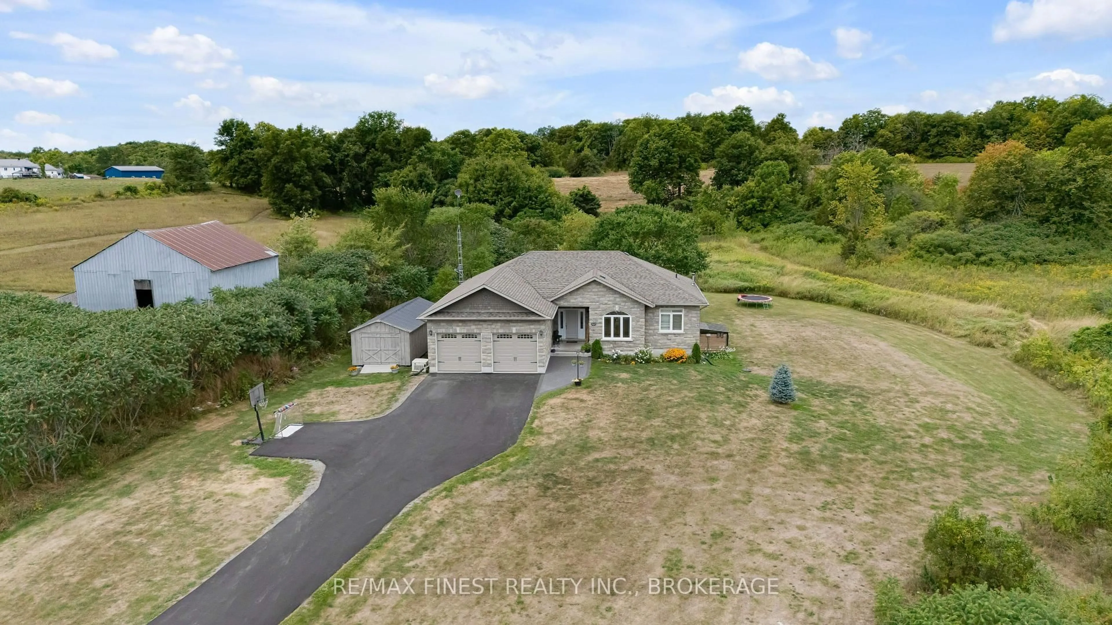 A pic from outside/outdoor area/front of a property/back of a property/a pic from drone, unknown for 3527 Battersea Rd, Bissett Creek Ontario K0H 2H0