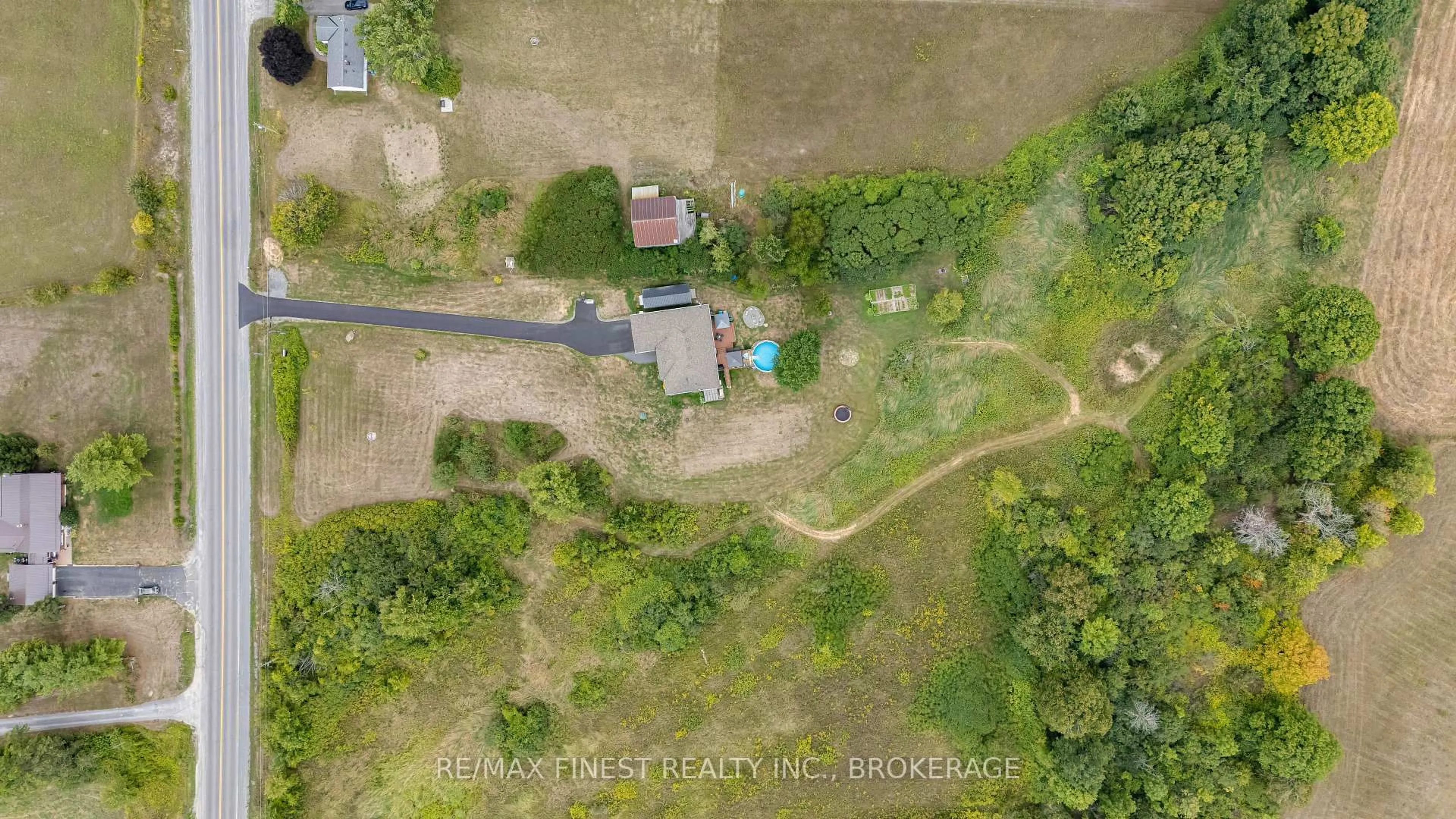 A pic from outside/outdoor area/front of a property/back of a property/a pic from drone, unknown for 3527 Battersea Rd, Bissett Creek Ontario K0H 2H0