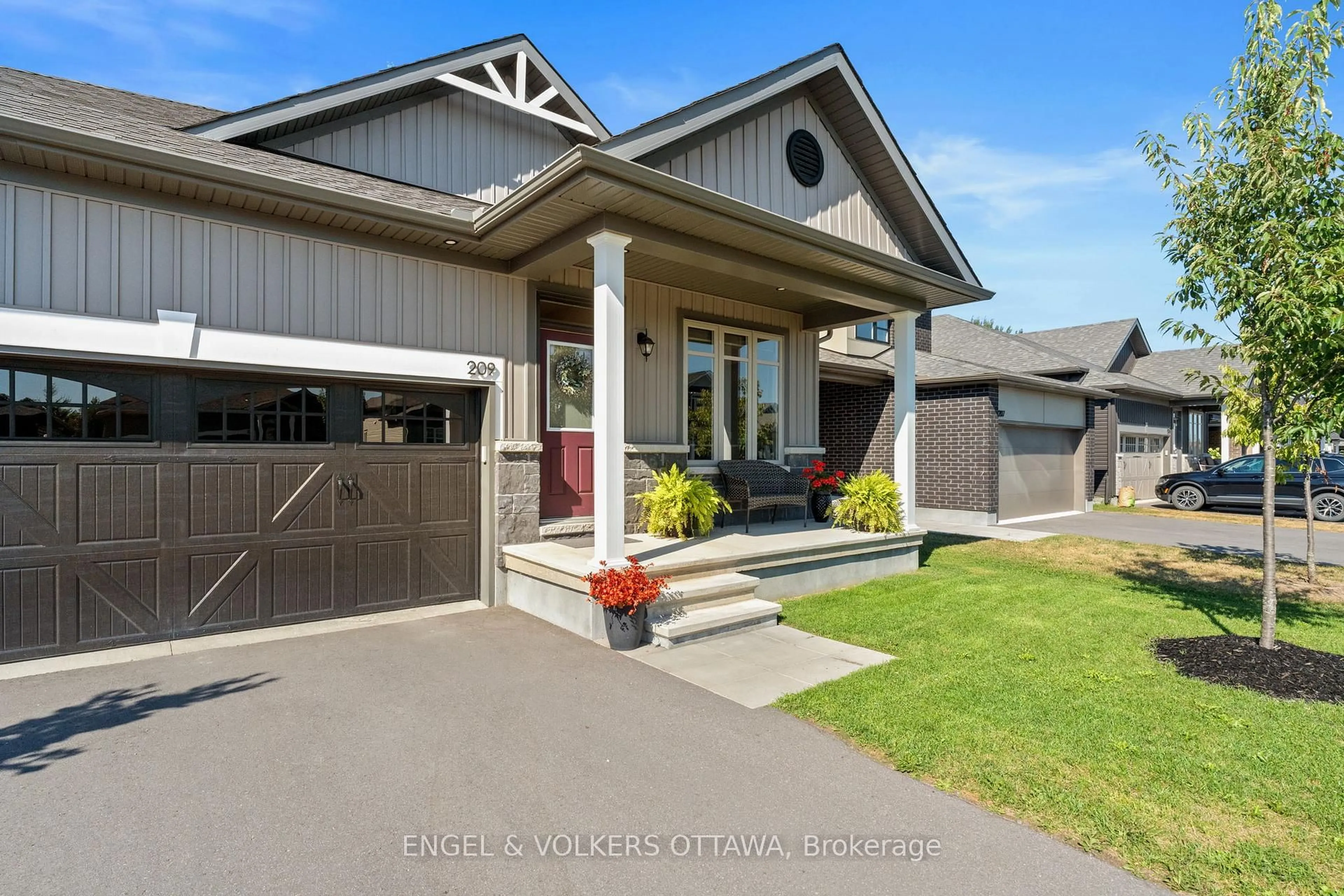 Home with vinyl exterior material, street for 209 Blackhorse Dr, North Grenville Ontario K0G 1J0