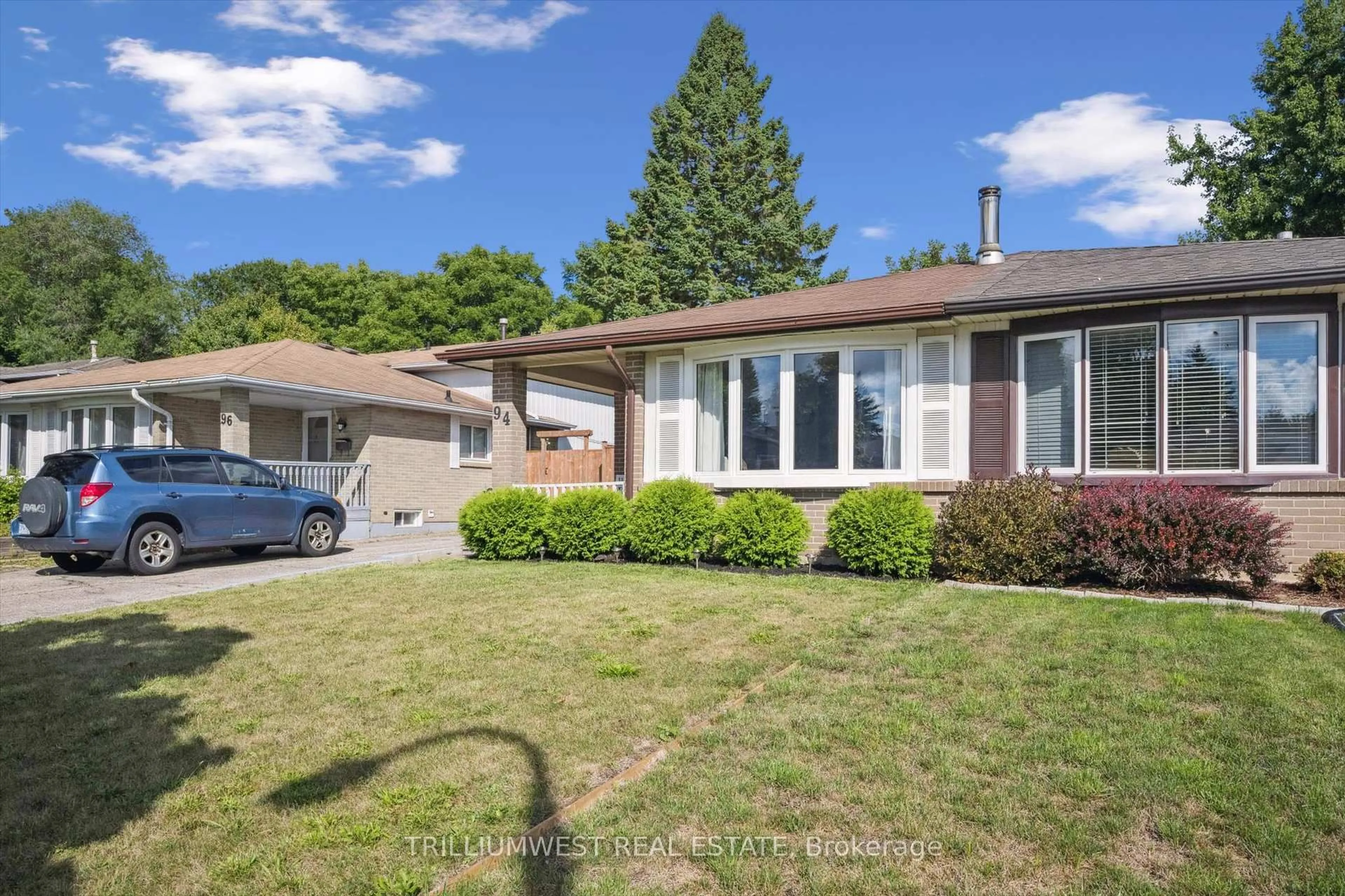 Home with vinyl exterior material, street for 94 Markwood Dr, Kitchener Ontario N2M 2H6