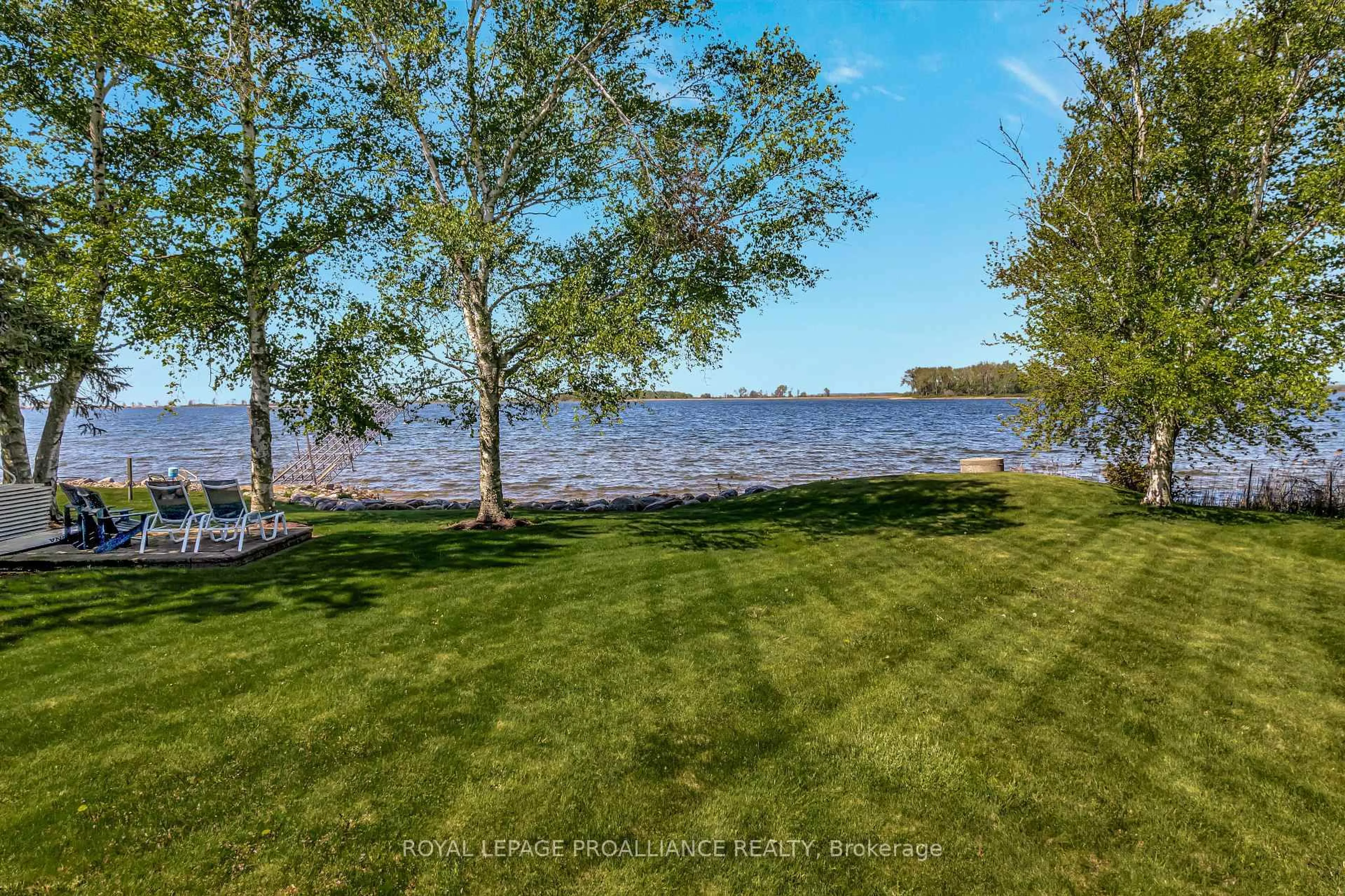 A pic from outside/outdoor area/front of a property/back of a property/a pic from drone, water/lake/river/ocean view for 23 Quigg Lane, Prince Edward County Ontario K0K 1L0