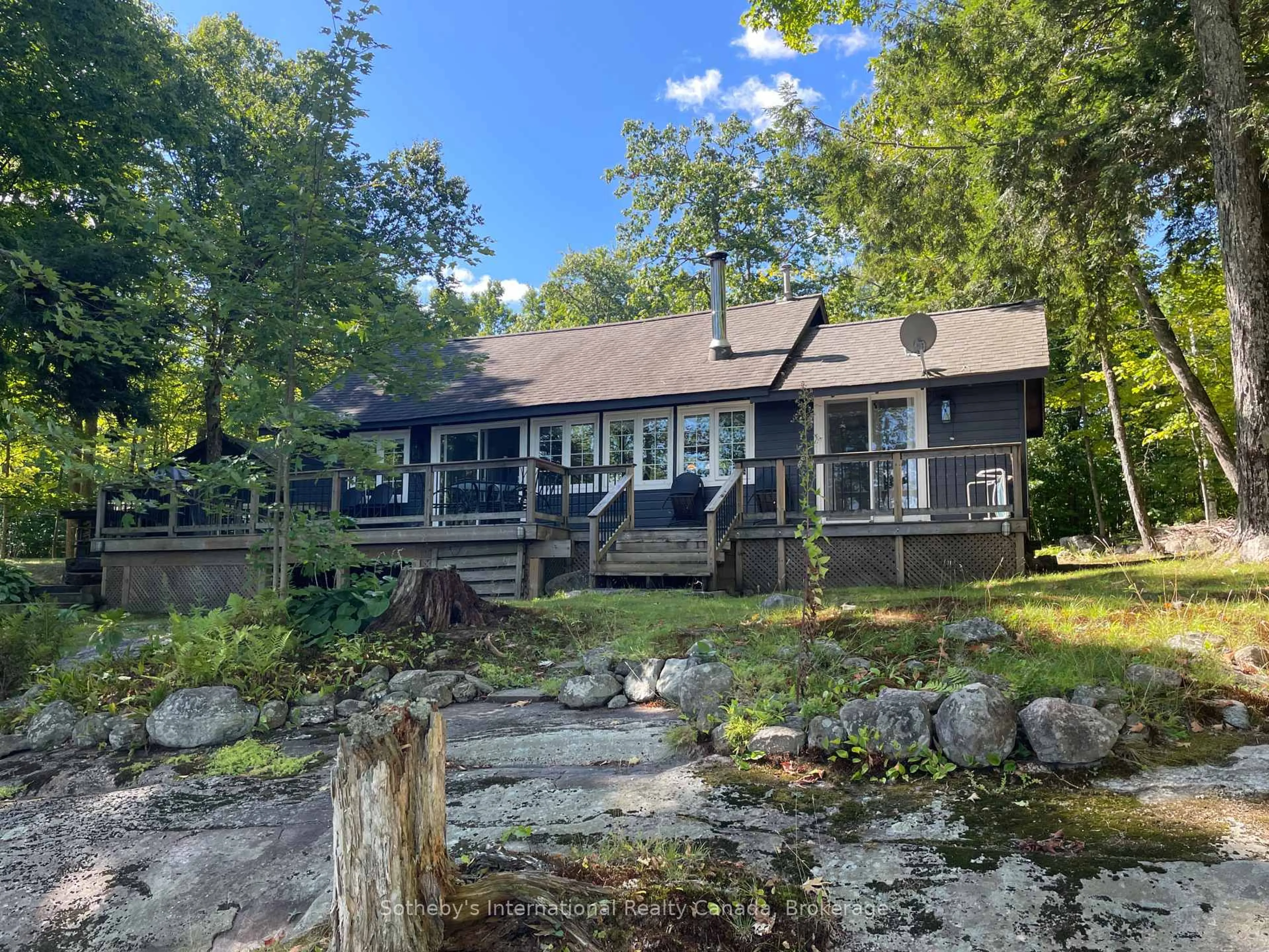 A pic from outside/outdoor area/front of a property/back of a property/a pic from drone, water/lake/river/ocean view for 1080 Long Lake Rd, Muskoka Lakes Ontario P0C 1A0