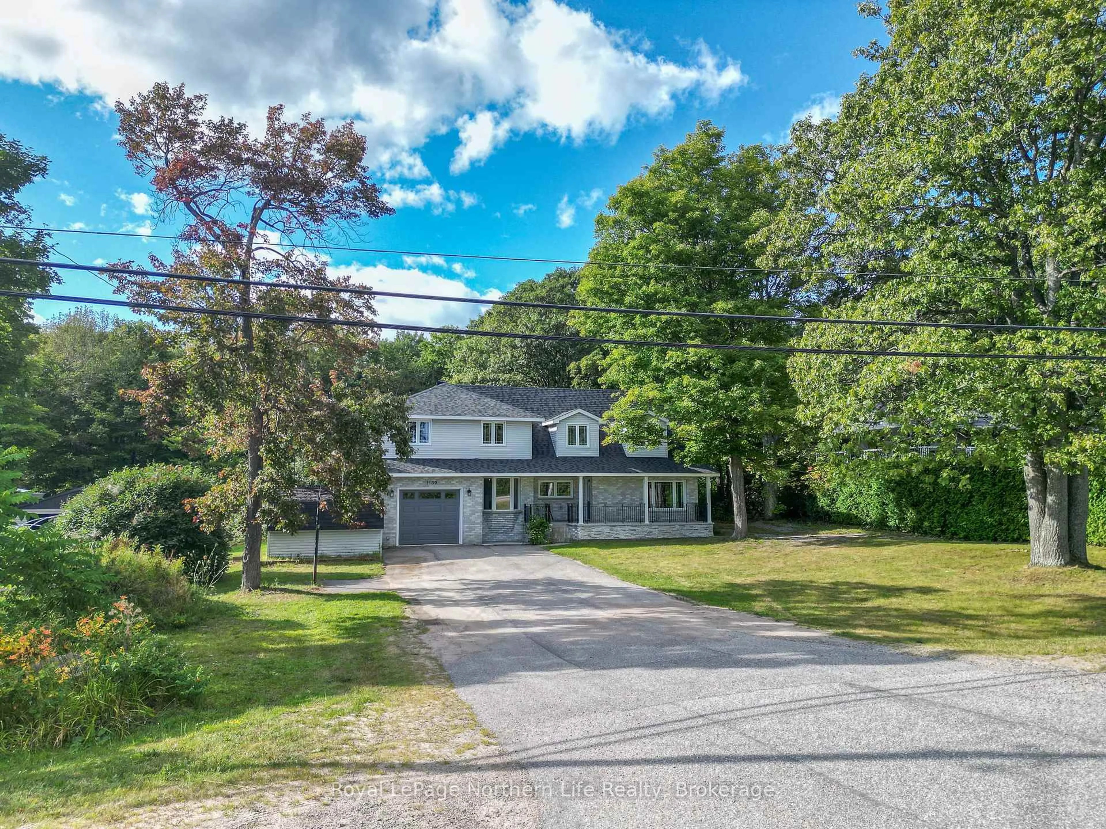 A pic from outside/outdoor area/front of a property/back of a property/a pic from drone, street for 1180 Airport Rd, North Bay Ontario P1B 8G2