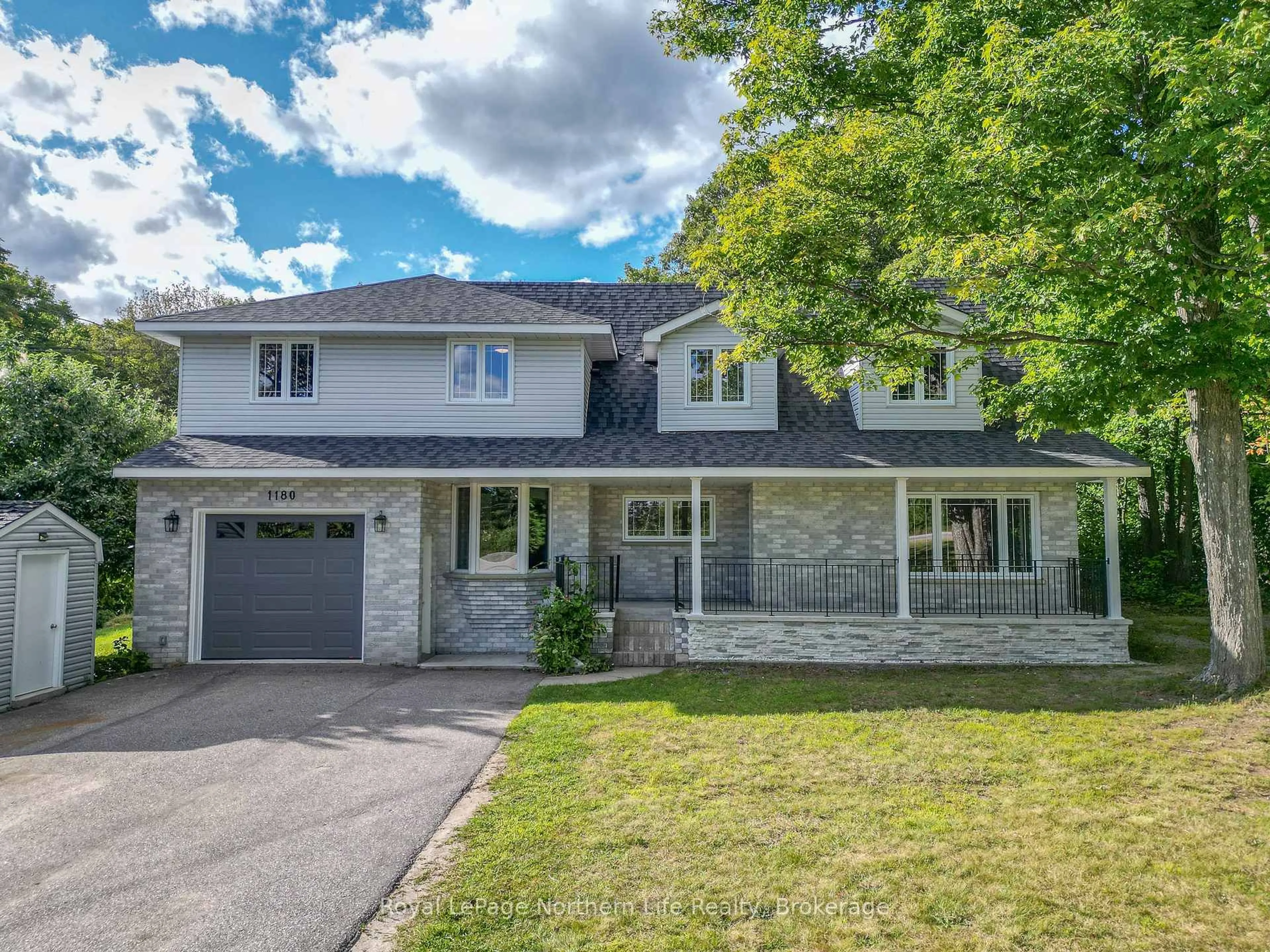Home with brick exterior material, street for 1180 Airport Rd, North Bay Ontario P1B 8G2