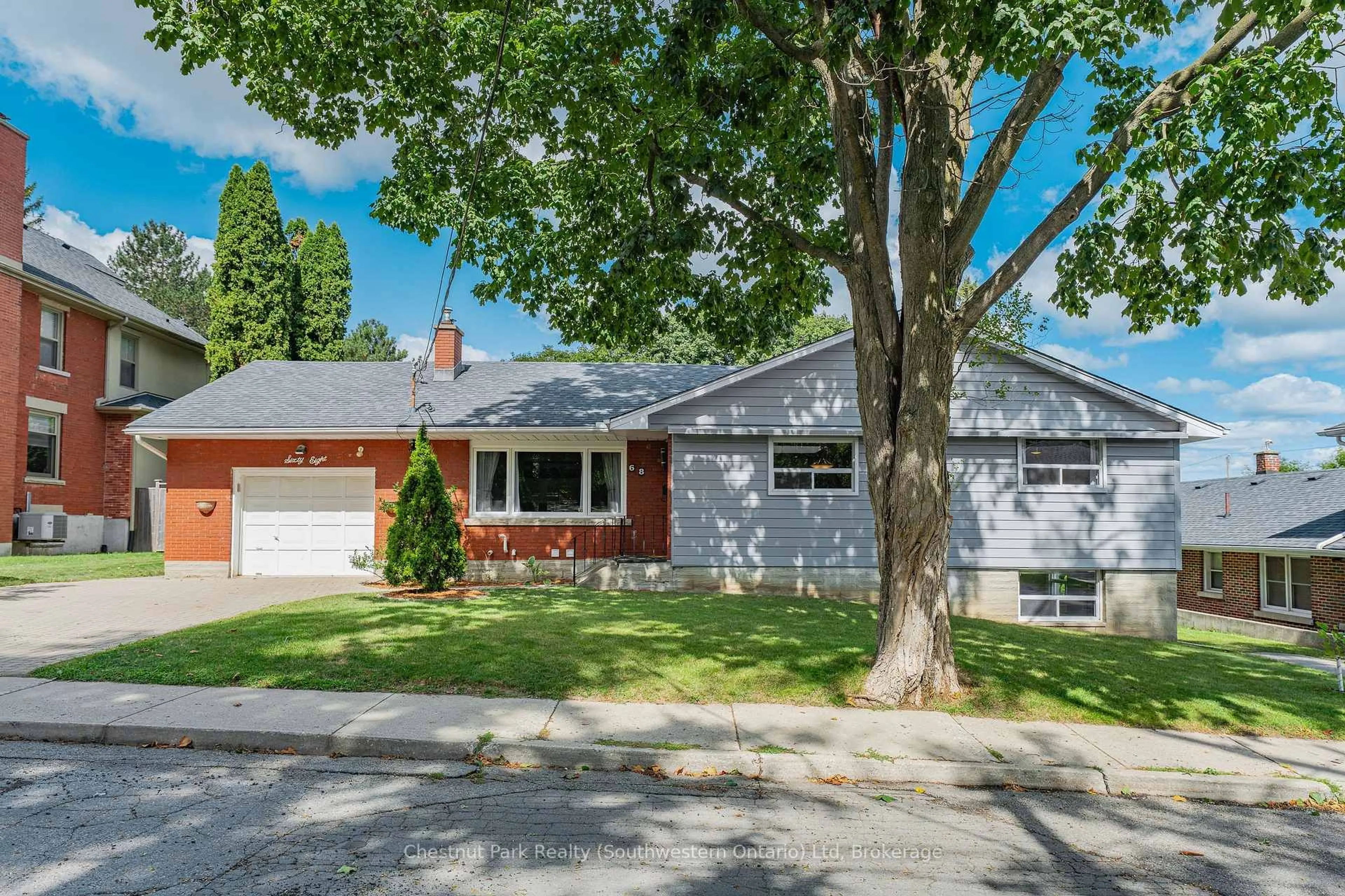 Home with vinyl exterior material, street for 68 Lemon St, Guelph Ontario N1E 2H3