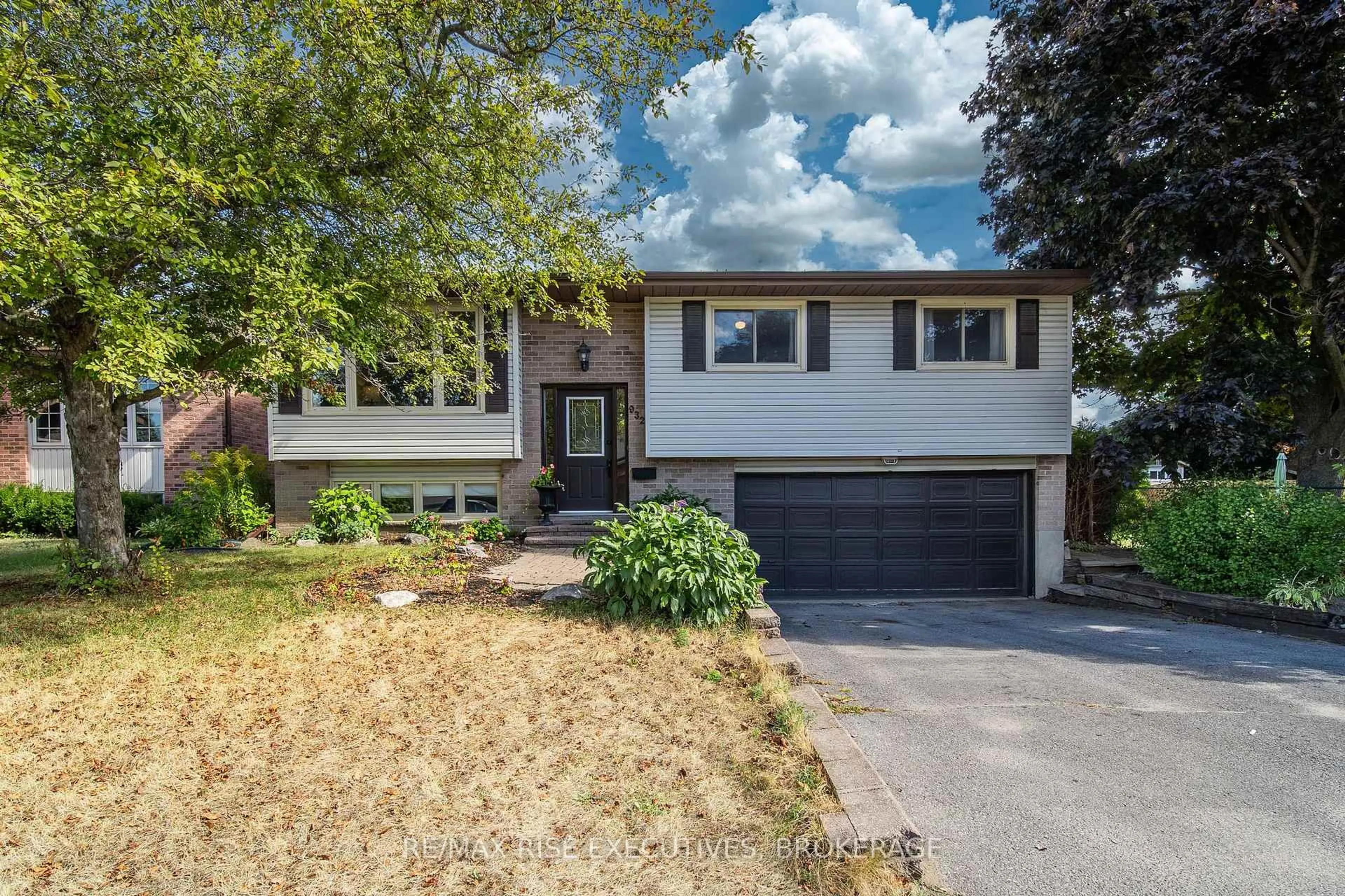 Home with vinyl exterior material, street for 932 Milford Dr, Kingston Ontario K7P 1N6