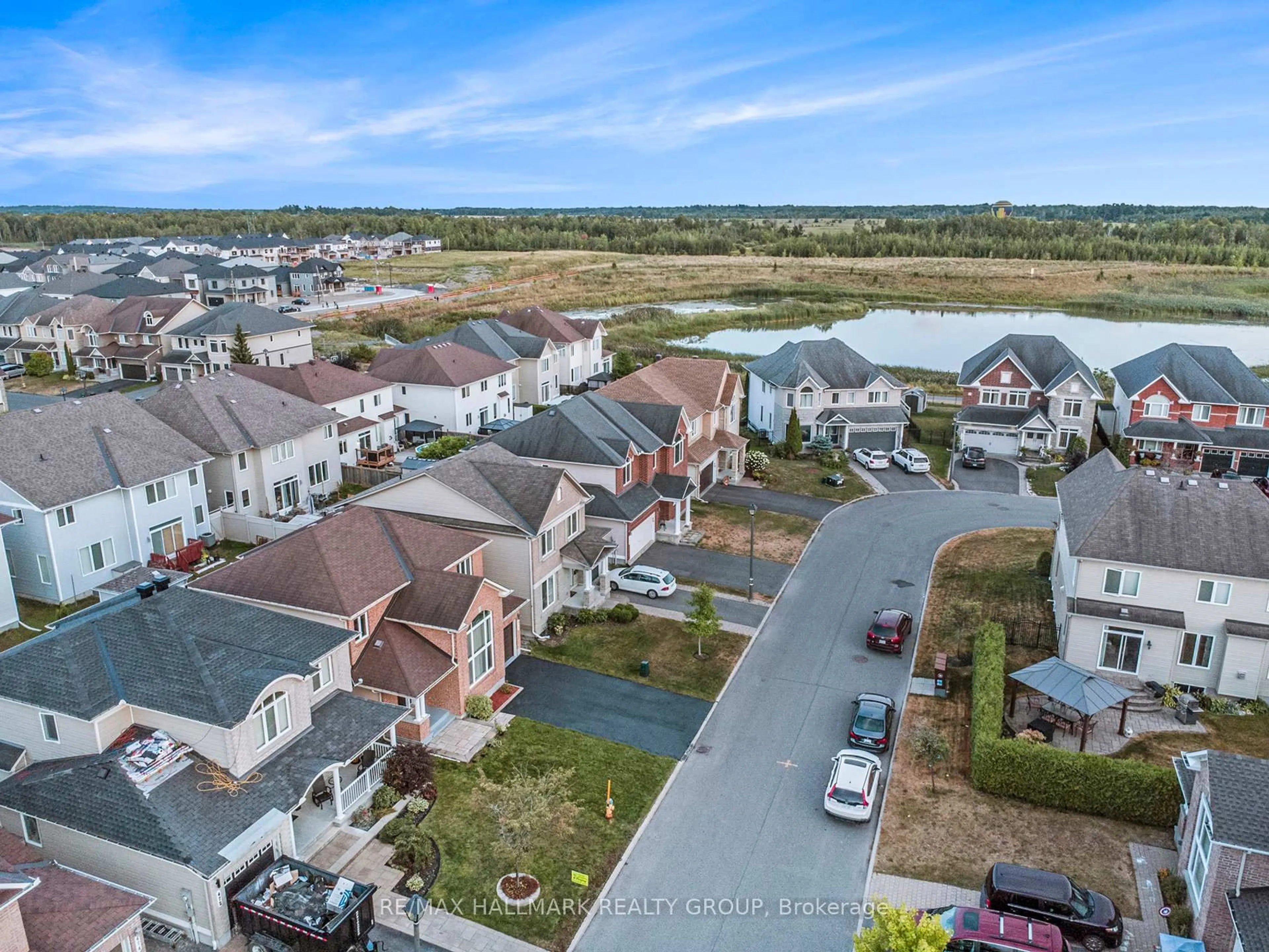 A pic from outside/outdoor area/front of a property/back of a property/a pic from drone, water/lake/river/ocean view for 470 Frank Cauley Way, Orleans Ontario K4A 0L5