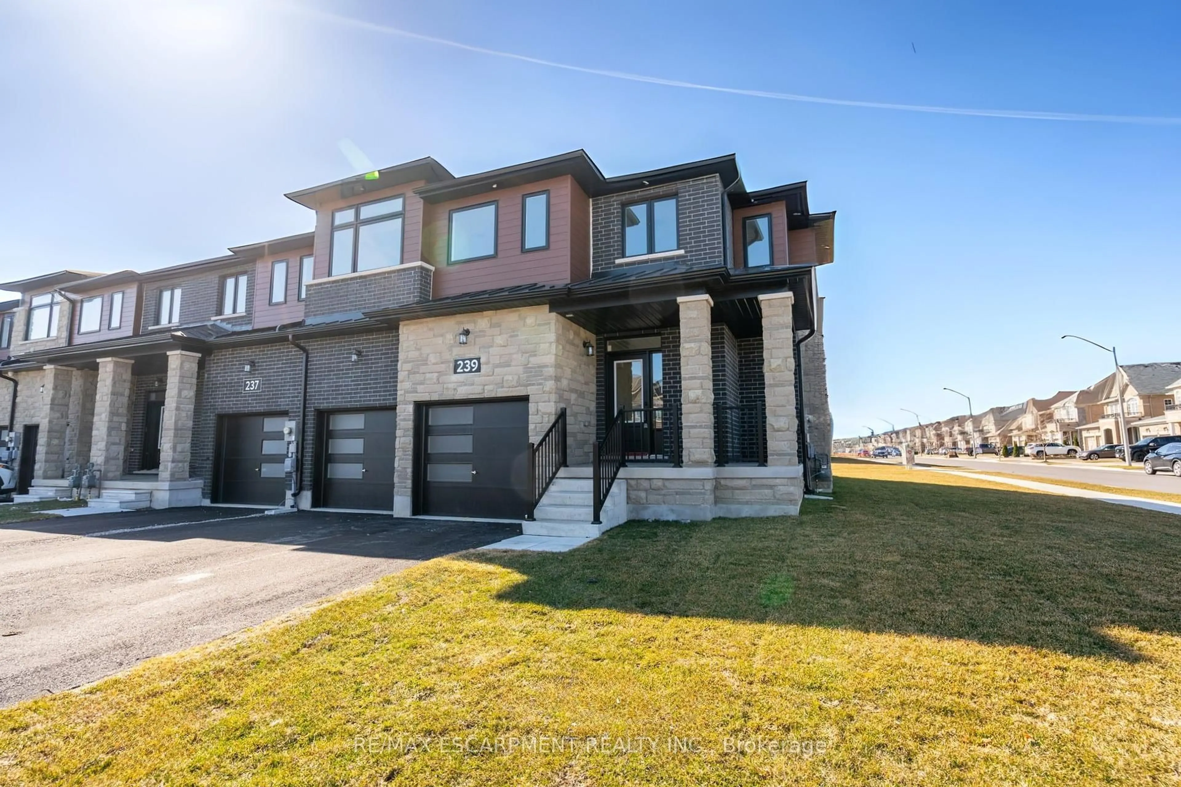 Home with brick exterior material, street for 239 LORMONT Blvd, Hamilton Ontario L8J 0K2