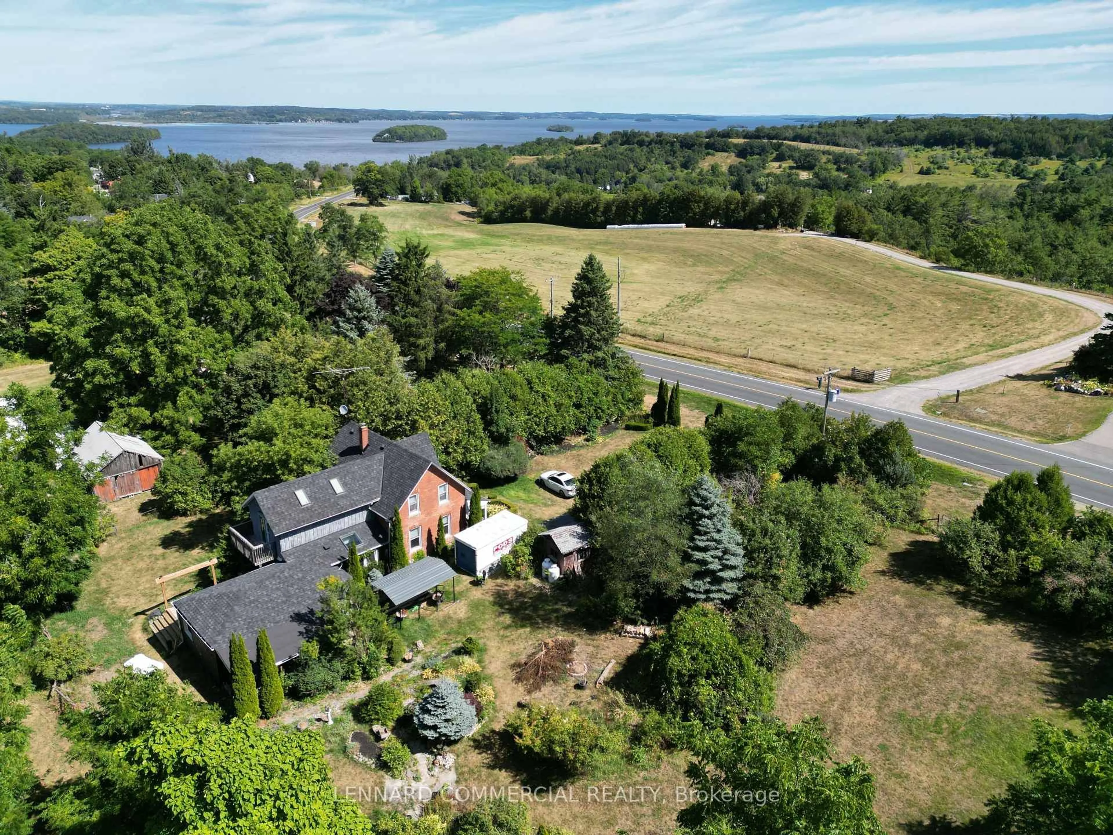 A pic from outside/outdoor area/front of a property/back of a property/a pic from drone, water/lake/river/ocean view for 5058 Burnham St, Hamilton Township Ontario K0K 2E0