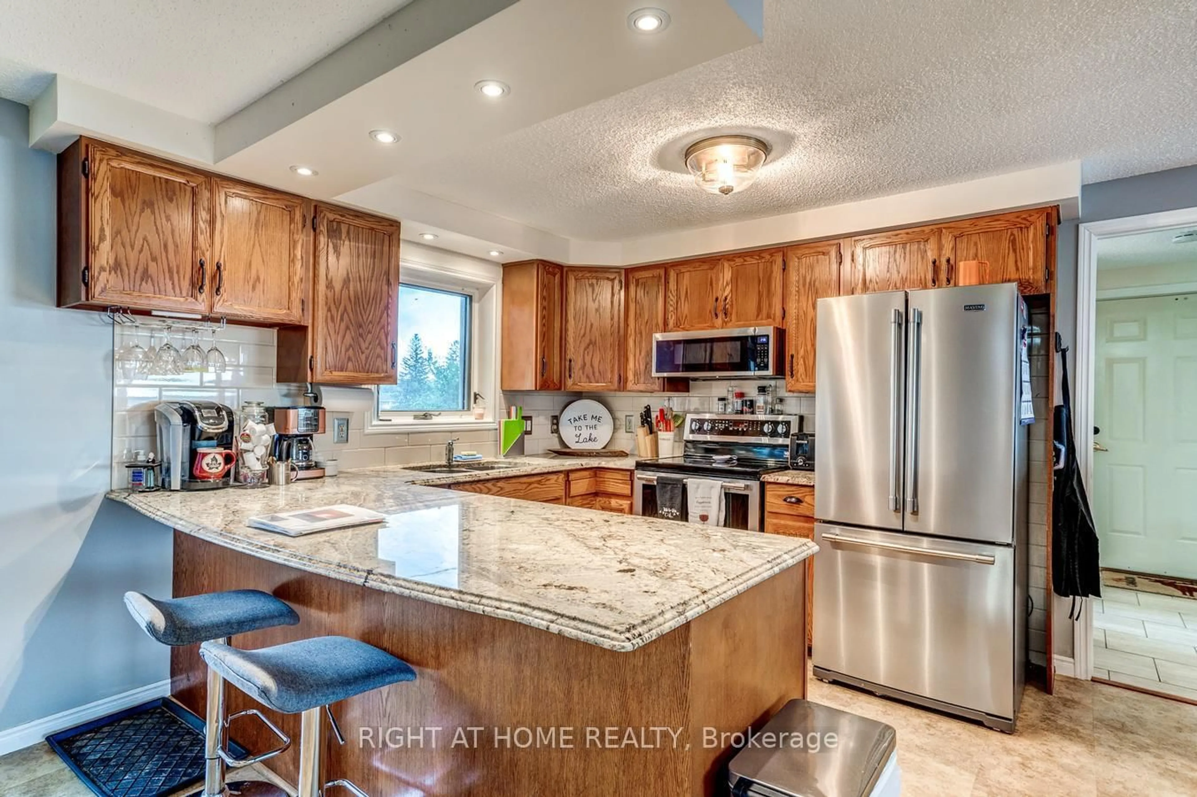 Open concept kitchen, ceramic/tile floor for 138 Starr Blvd, Kawartha Lakes Ontario K0M 2C0