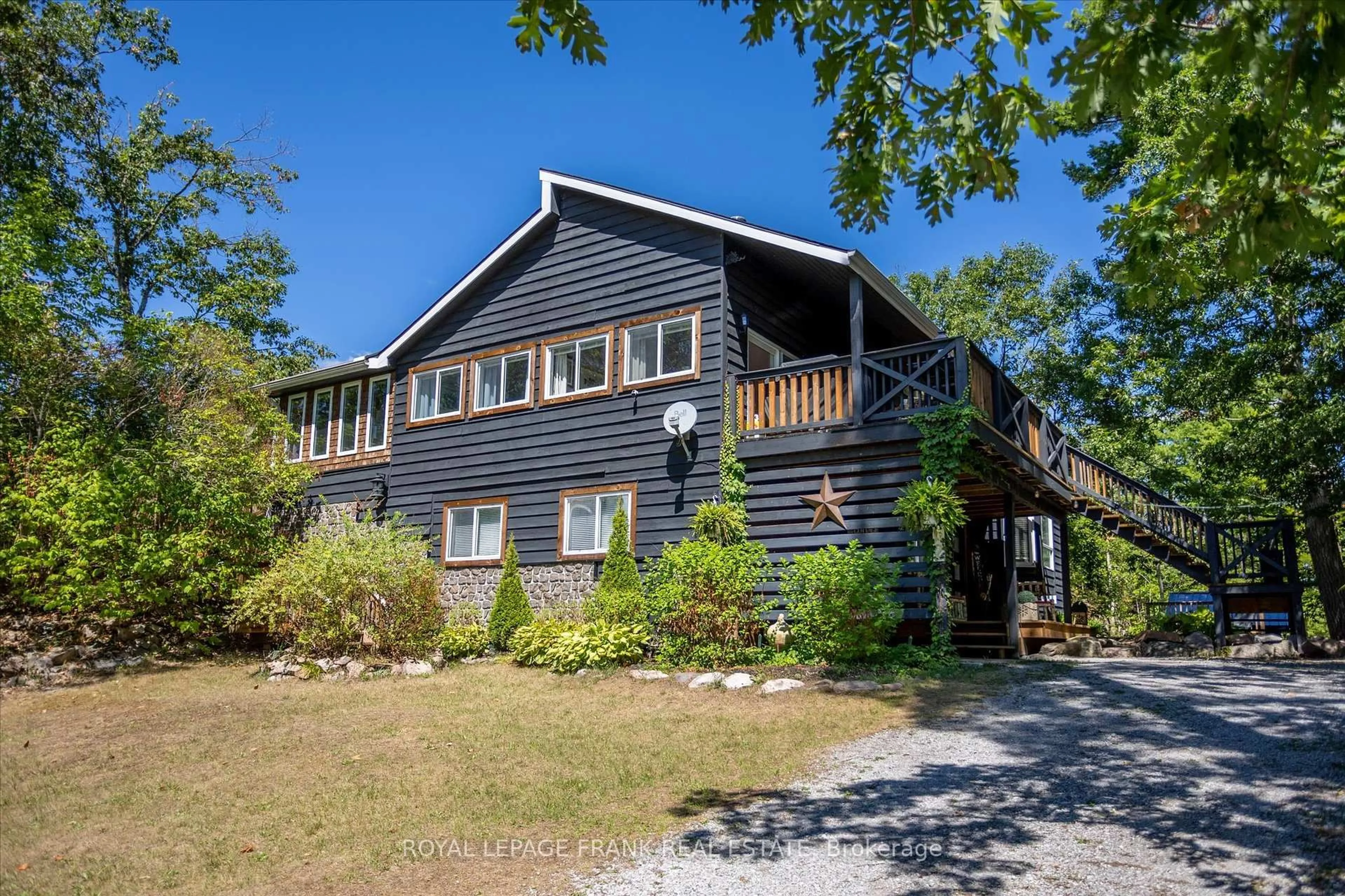 A pic from outside/outdoor area/front of a property/back of a property/a pic from drone, unknown for 62 Fire Route 79A Rte, Trent Lakes Ontario K0L 1J0