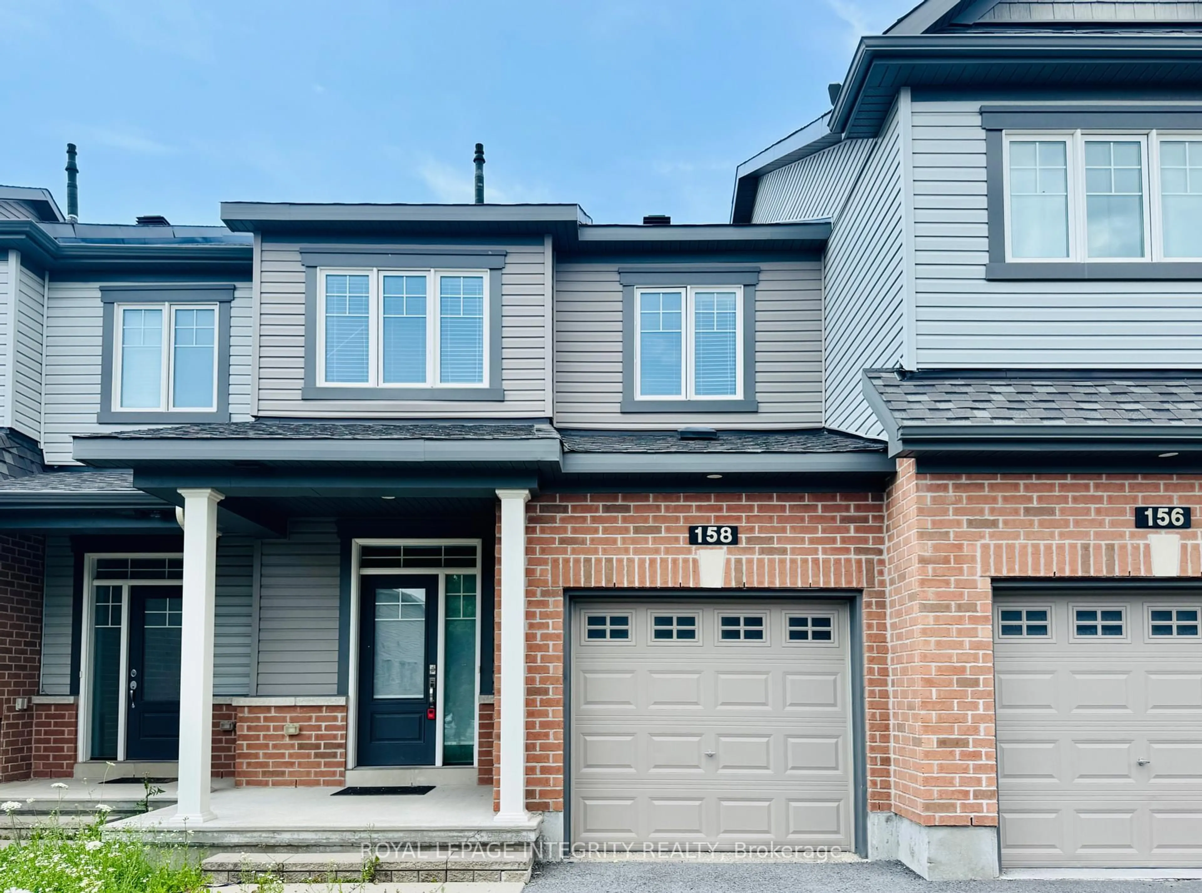 Home with brick exterior material, street for 158 Bandelier Way, Stittsville Ontario K2S 2J6