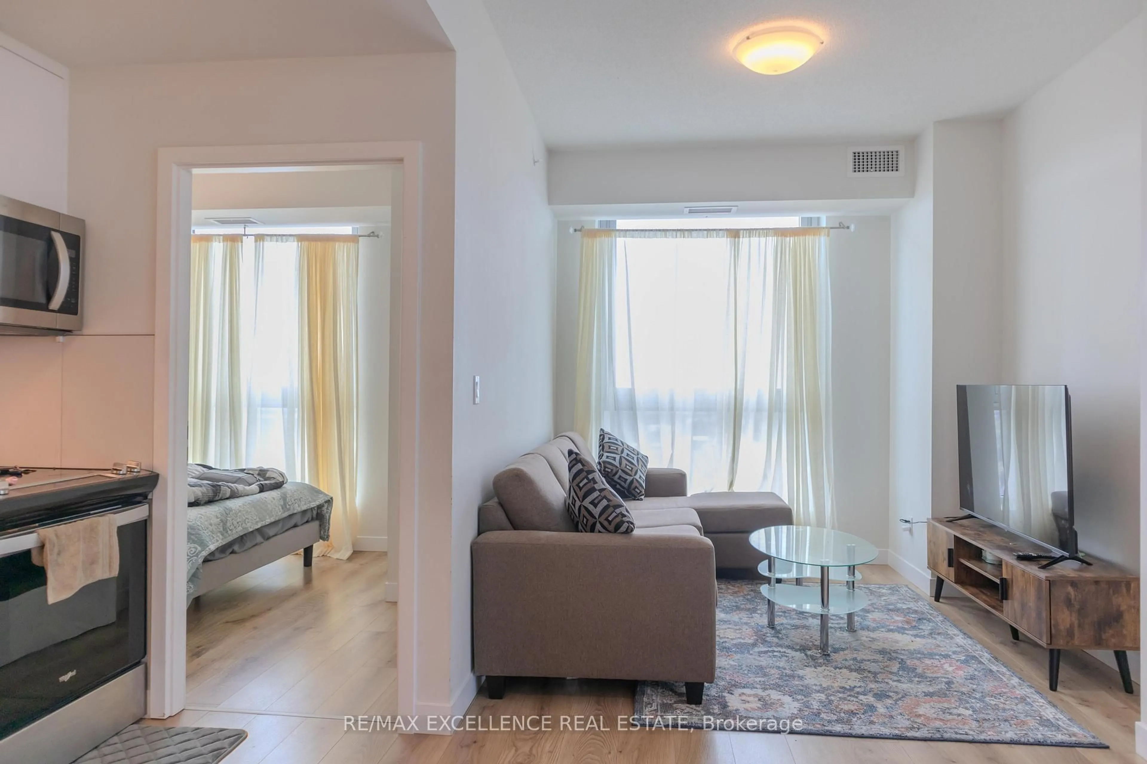 Living room with furniture, unknown for 60 Frederick St #2702, Kitchener Ontario N2H 0C7