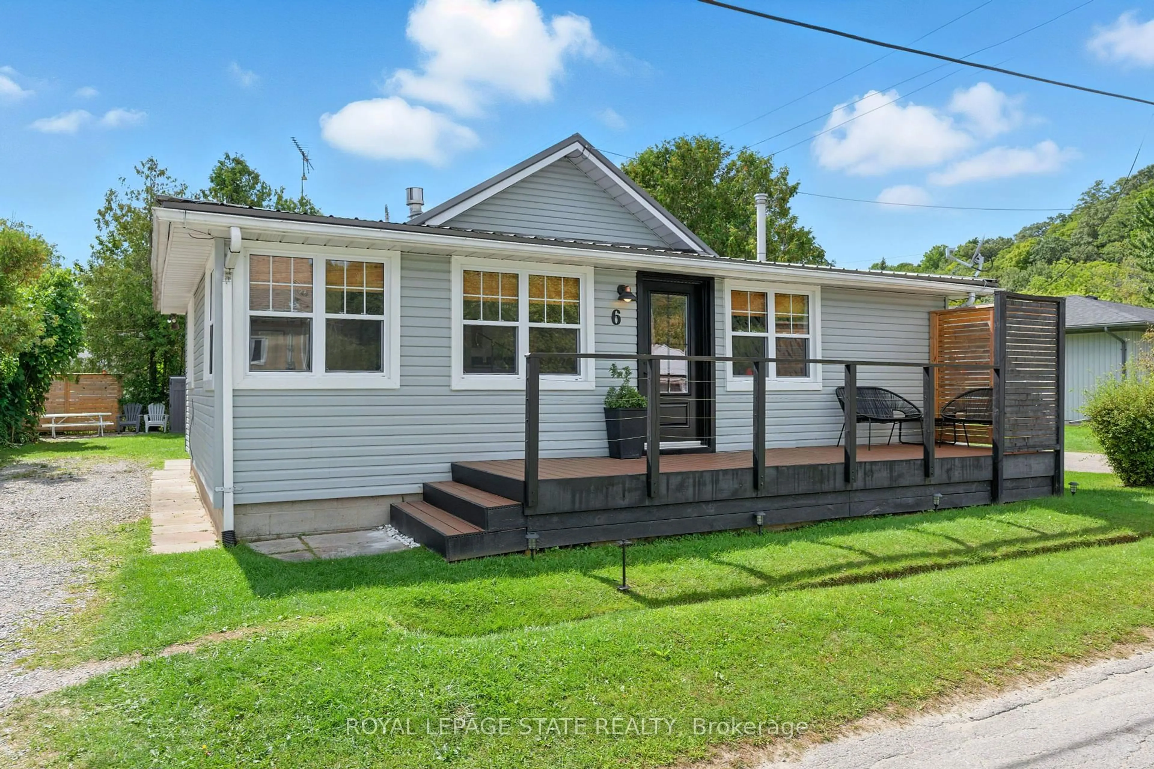Home with vinyl exterior material, street for 6 Old Hill Rd, Norfolk Ontario N0E 1W0