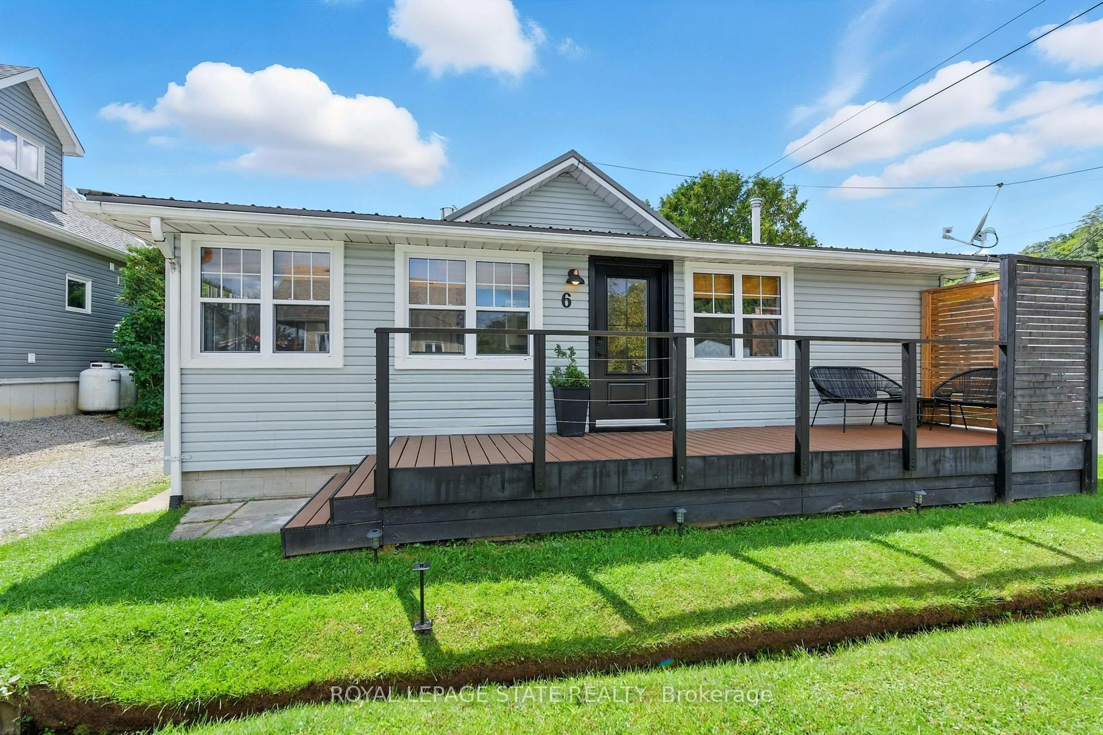 Home with vinyl exterior material, street for 6 Old Hill Rd, Norfolk Ontario N0E 1W0