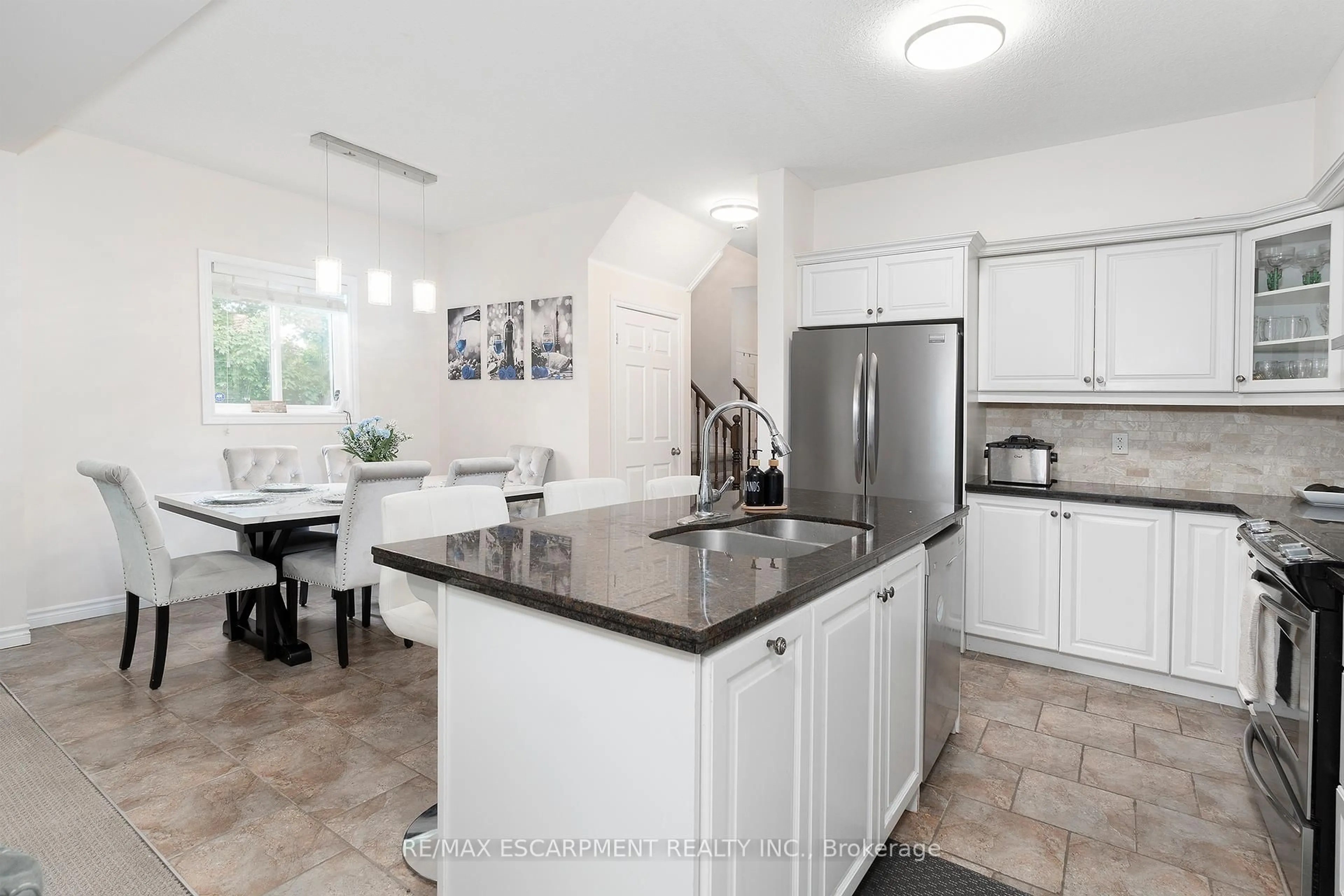 Open concept kitchen, ceramic/tile floor for 345 Glancaster Rd #14, Hamilton Ontario L9G 3A4
