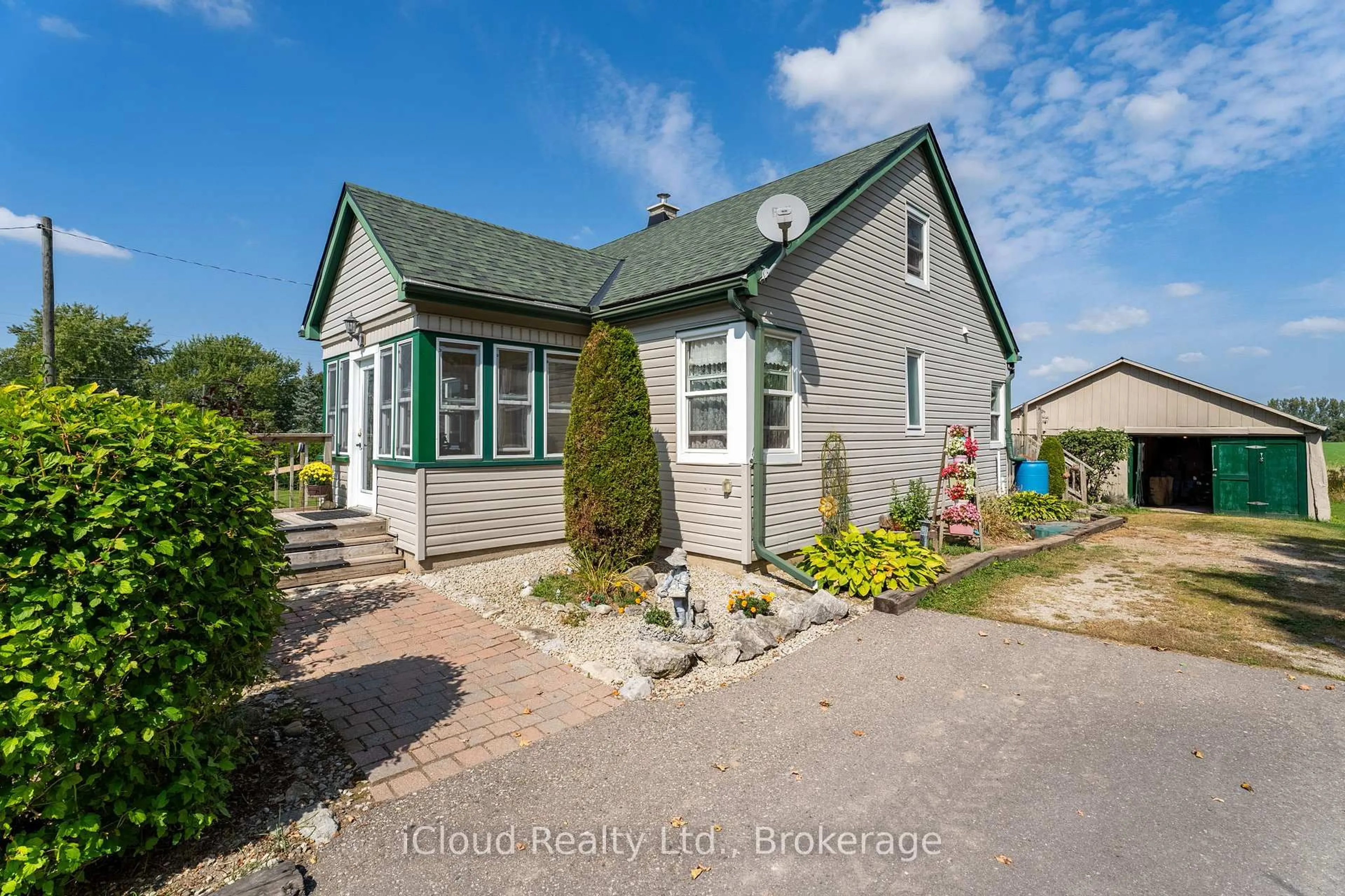 A pic from outside/outdoor area/front of a property/back of a property/a pic from drone, street for 191281 13th Line, East Garafraxa Ontario L9W 7B4